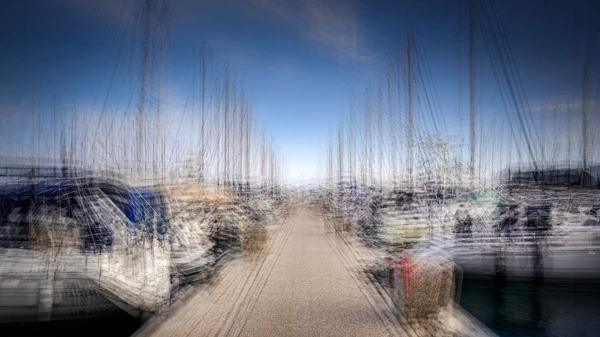 Nicole Holz - Fine Art Editions |  Marina Santo Stefano al Mare | Multi-layered in-camera exposures captured strictly on location along the Ligurian coast. By fusing the raw dynamics of sea and light with the delicate geometry of harbors into fluid, impressionistic sanctuaries, this series stands as a testament to deliberate human craftsmanship and authentic vision in a digital age.