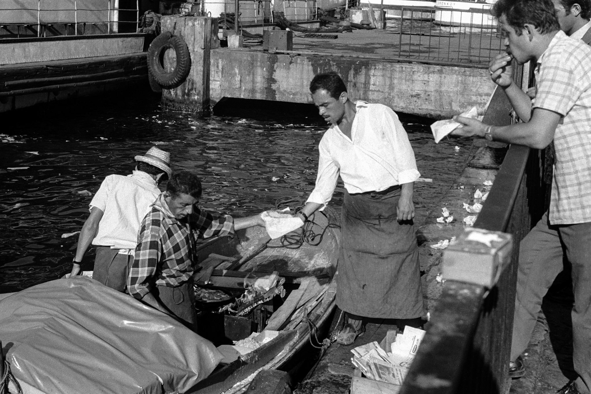 Selling fried fish near the Galata Bridge.