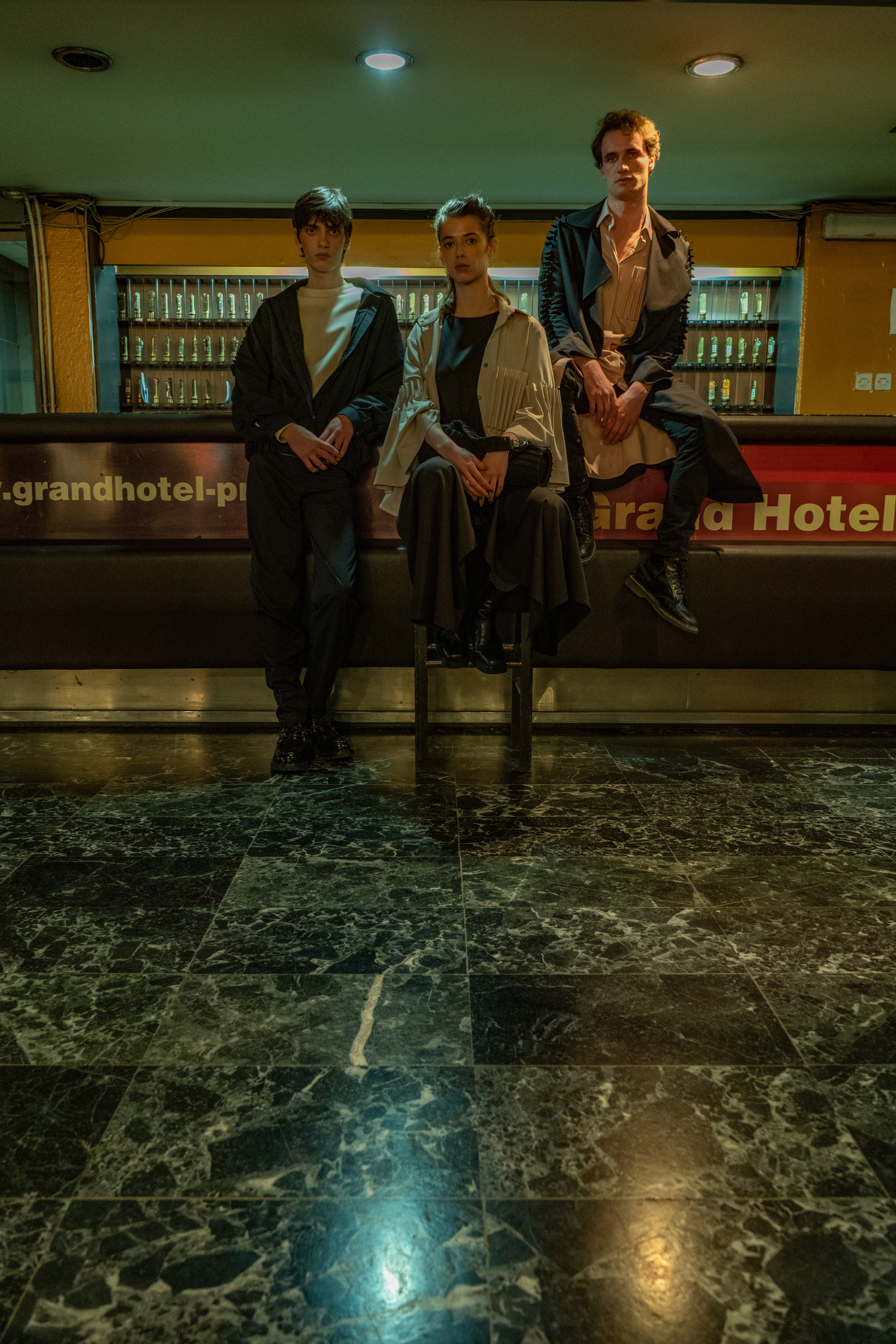 GRAND HOTEL PRISTINA - A sad woman in her fifties normally mans reception while several very surly men look askance from the concierge's desk