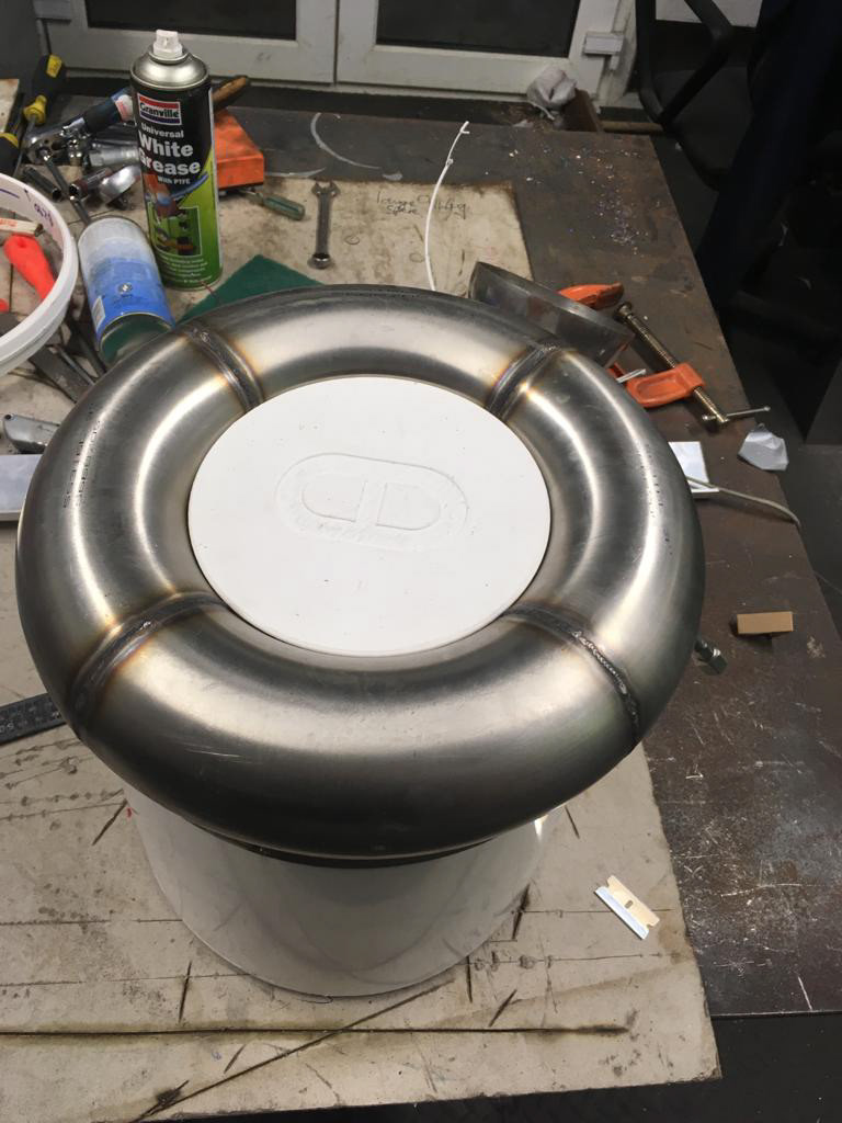 First lower toroidal tank