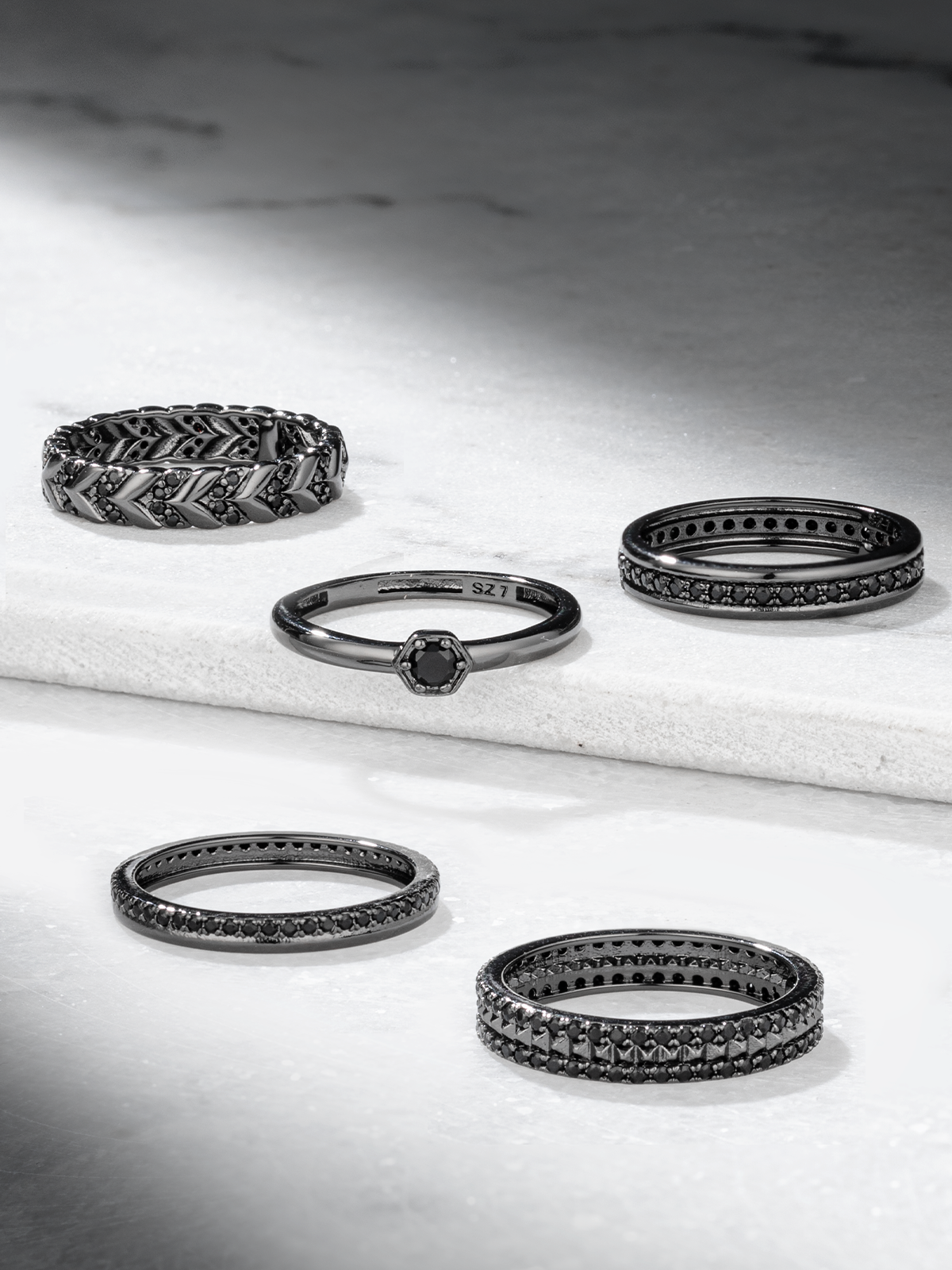 Charmed Aroma Black Gold stackable ring collection