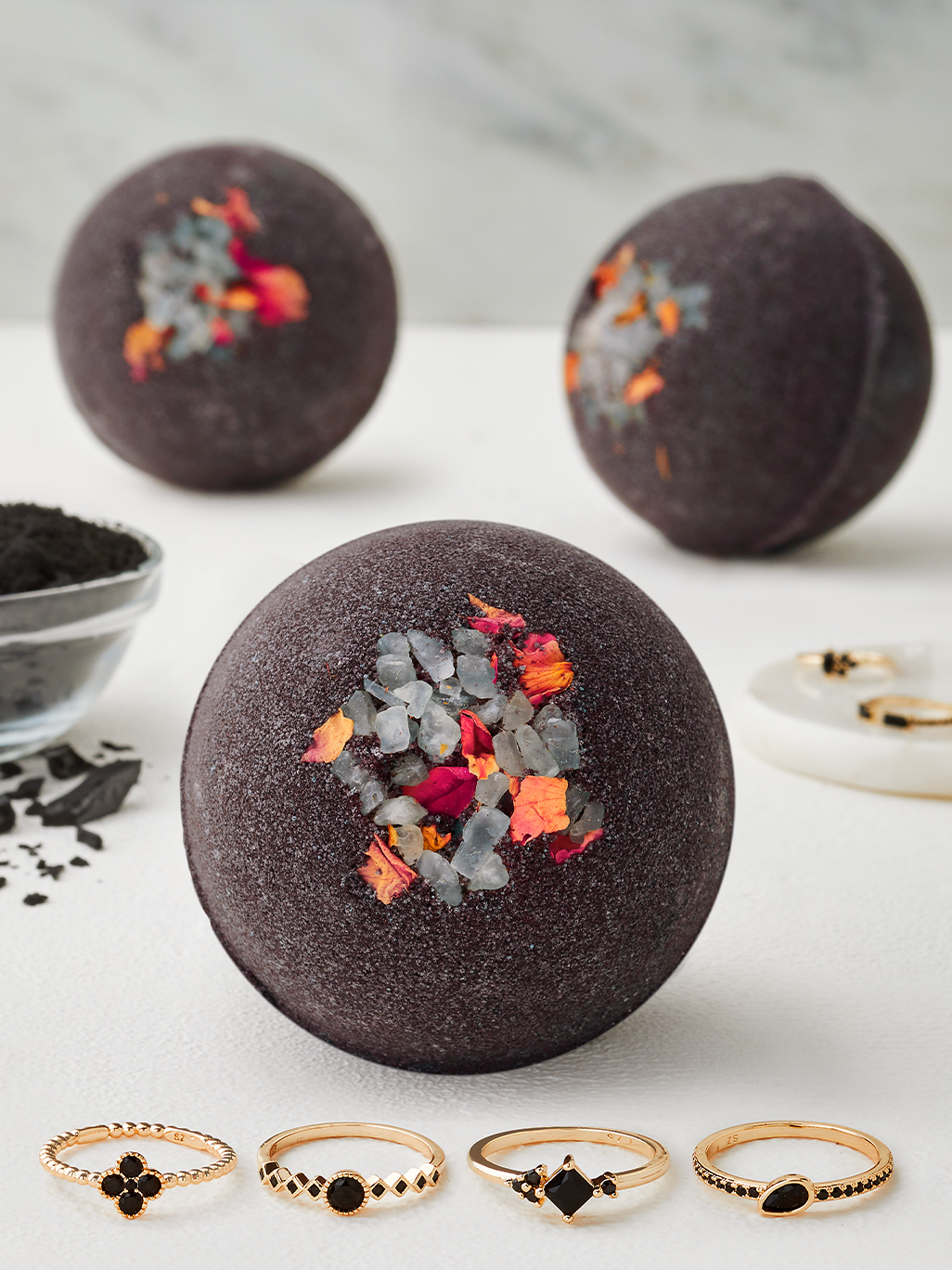Charmed Aroma Charcoal Bath Bomb with gold Dainty Rings