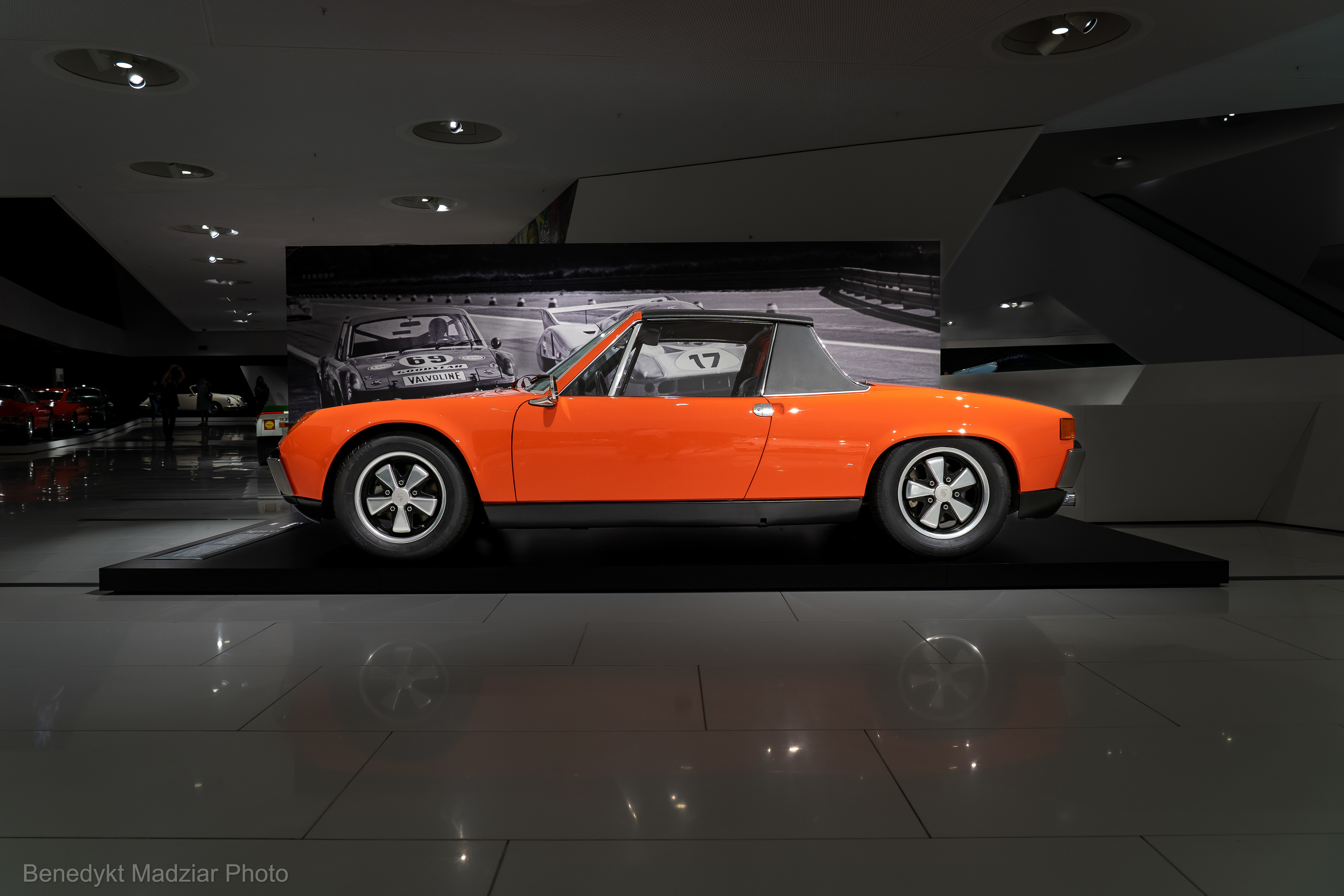 Porsche 914 S was presented at the IAA in Frankfurt am Main in 1969. Initially, the 914 model had a 4-cylinder Volkswagen engine with a capacity of 1.7 liters and a power of 80 HP. The 914/6 version already had a Porsche 6-cylinder engine with a capacity of two liters and a power of 110 HP. Both engines were air-cooled boxer engines. In total, approximately 120,000 units were sold until 1976, when production of the 914 ended. The Porsche 914 is an original, but also quite controversial model, which was simply called a Volkswagen by many (mainly by Porsche enthusiasts). It definitely began to enjoy greater recognition only after many years, when it was appreciated simply for being how it is - original styling, easy of driving and definitely cheaper to maintain than other Porsche models.  The model 914 S - only two created in this version. It was equipped with an engine (used in racing) from the Porsche 908, i.e. an 8-cylinder air-cooled boxer, but it was placed centrally like in the classic 914. The first copy - the model in the photos - was created for Ferry Porsche for his 60th birthday and had power 300 HP. The second copy was created for Ferdinand Piëch - the then head of Porsche development, designer of the 917 model (described above) and it had power of 350 HP. The external appearance of the S version, or otherwise 914-8, differs little from the basic 914 variants.
