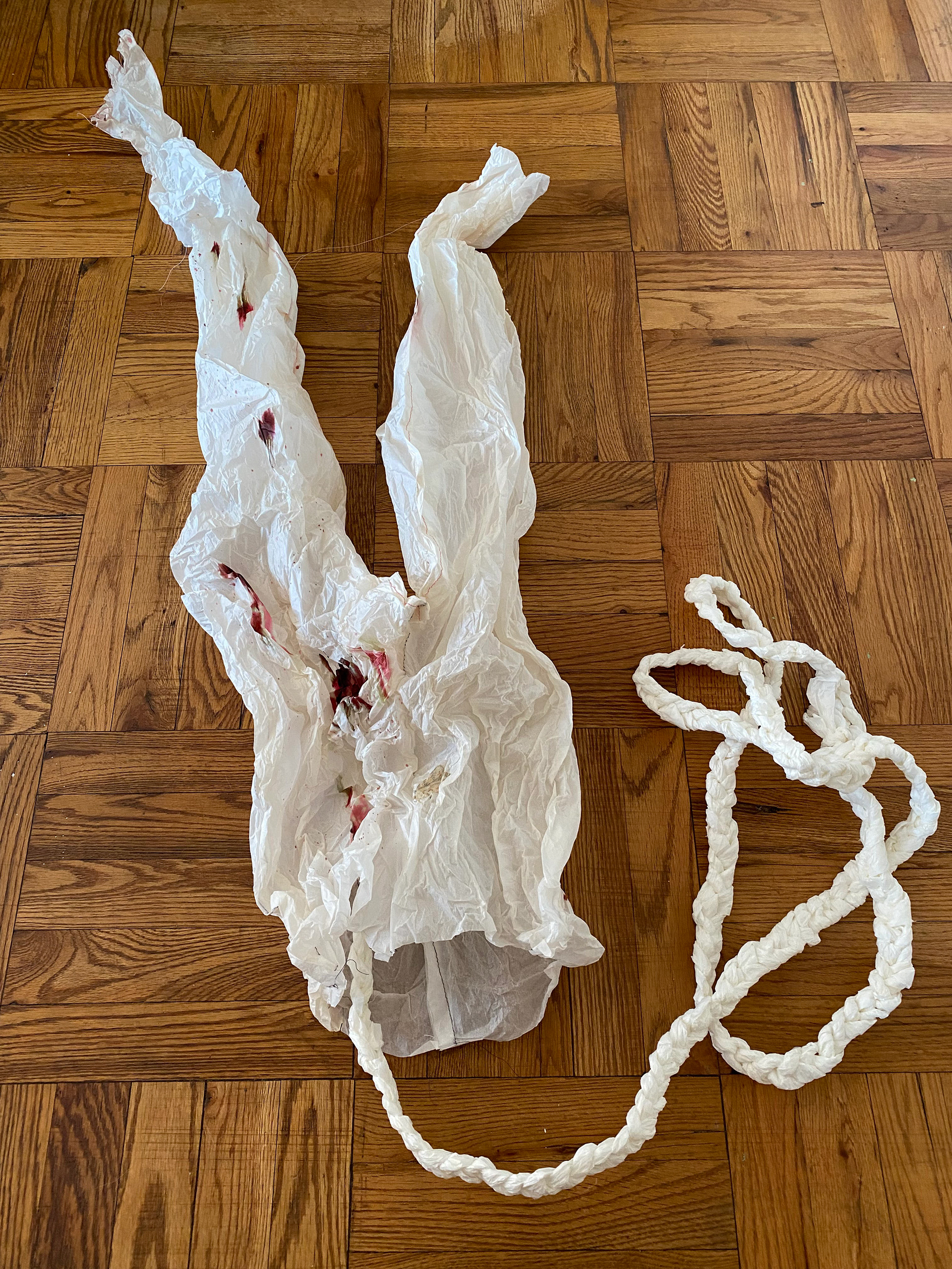 Husk. 2023. Tracing paper, ink, thread and pins. 56"x28"x6".