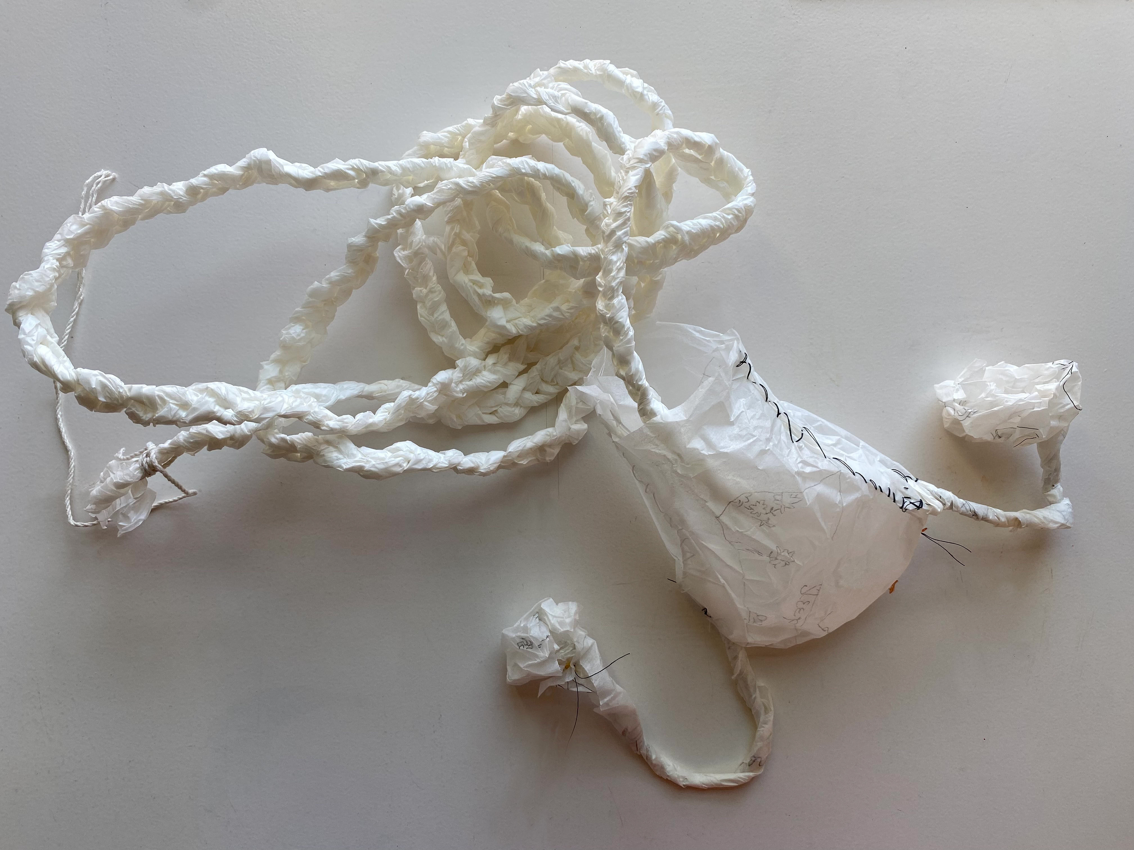 Take it, I seem to be done with it. 2023. Tracing paper, ink, thread and pins. 17"x12"x5".