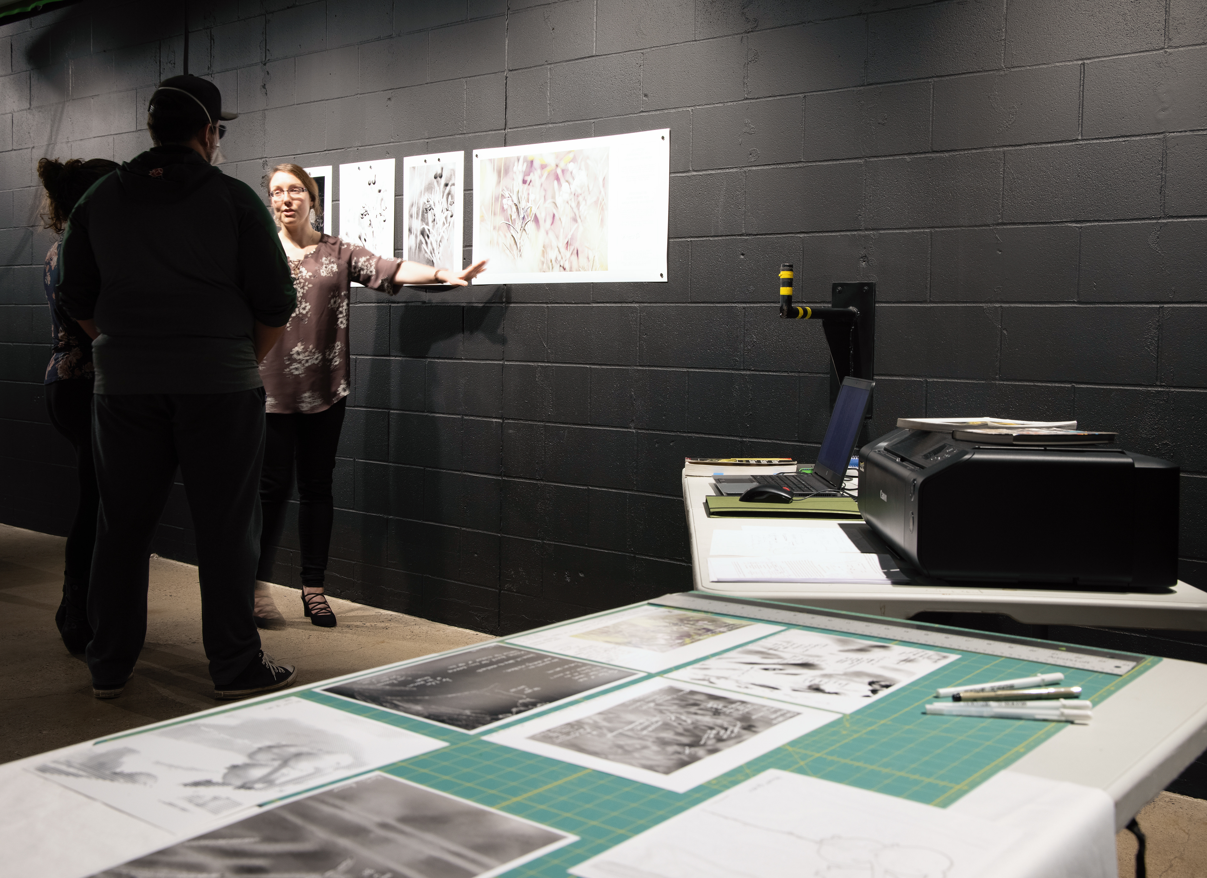 Ellie discusses "Blooming Personality XV: Nauseated Teenager" at the Territoires Visuels, Territoires Transformés Artistic Residency exhibit at PAVED Arts, Saskatoon (Oct 2022).