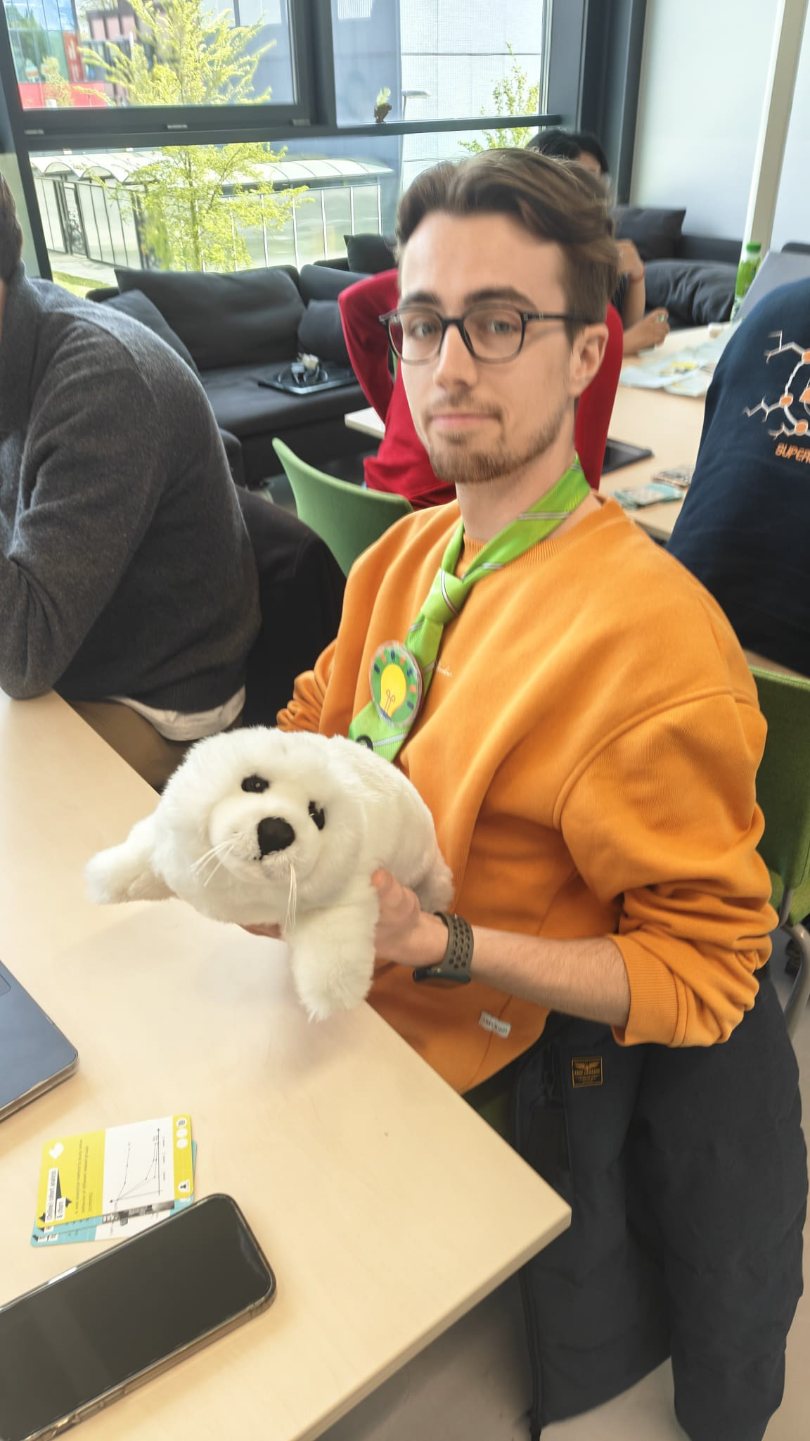 Seal (left) and Maurits (right), demonstrating a low-fidelity physical proxy for animal behaviour in a bodystorming exercise.