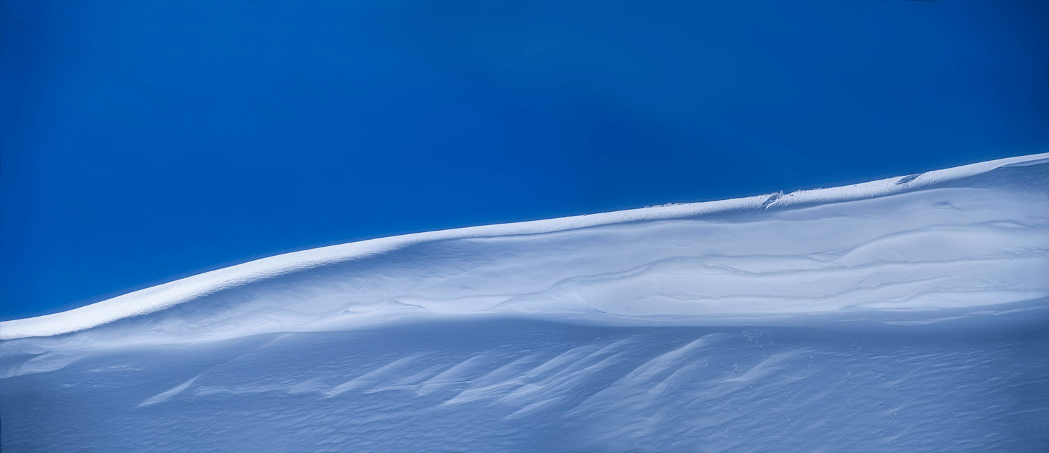 #4139 Panorama of a Snow Cornice Against the Blue Sky