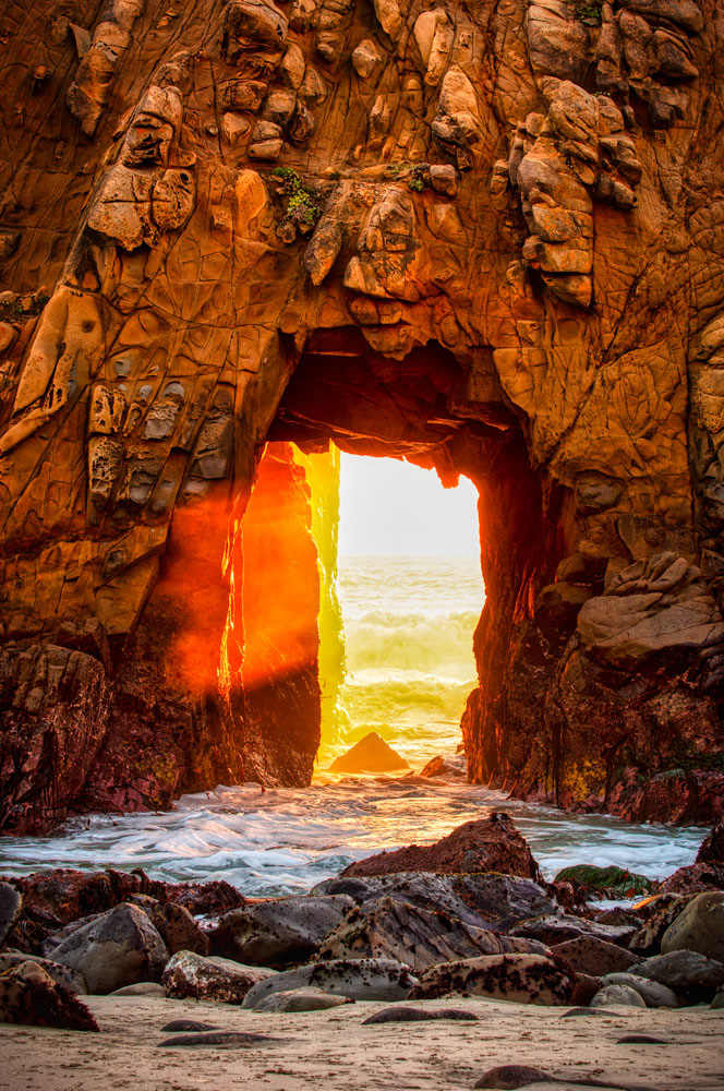 #1026 Late Afternoon Sunlight Shining Through a Hole in the Rock Wall on the Big Sur Coast
