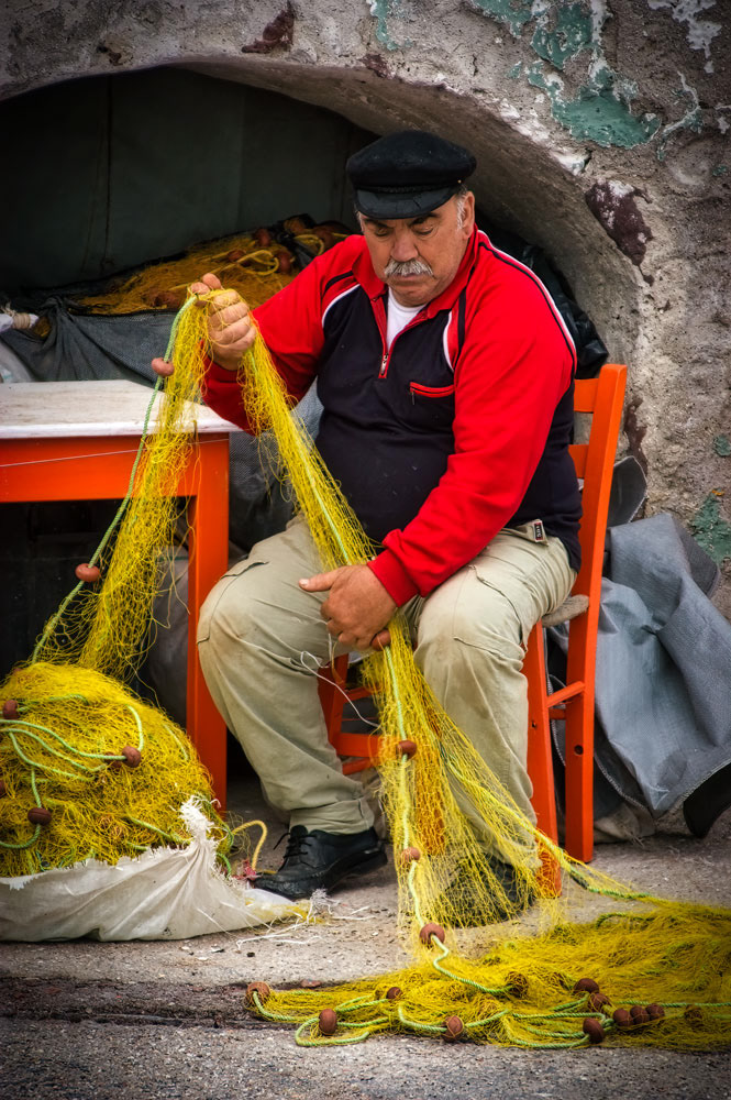 #2930 Fisherman Arranging Fish Net on the Island of Santorini