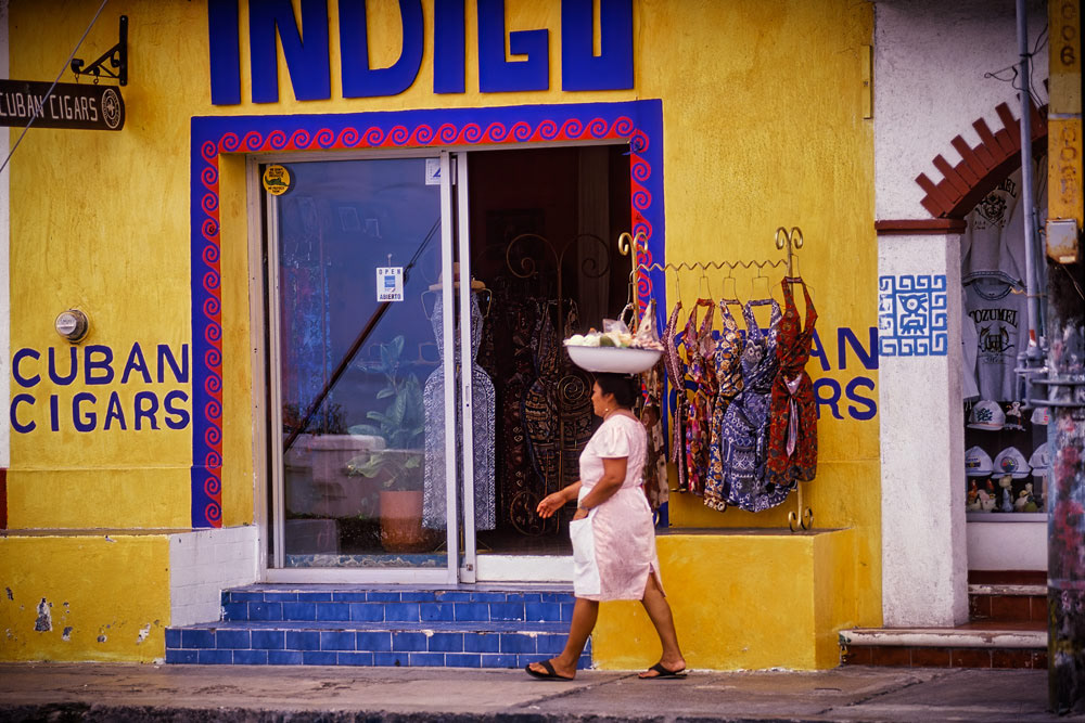 #4055 Woman Balancing a Basket while walking on the Island of Cozumel