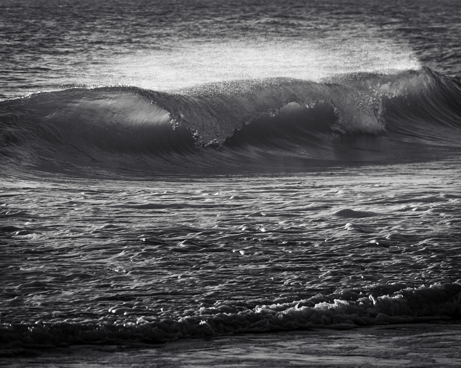 Ocean waves at Sunrise on Ballston Beach in Truro, MA in Cape Cod. (photo by Gabe Palacio)