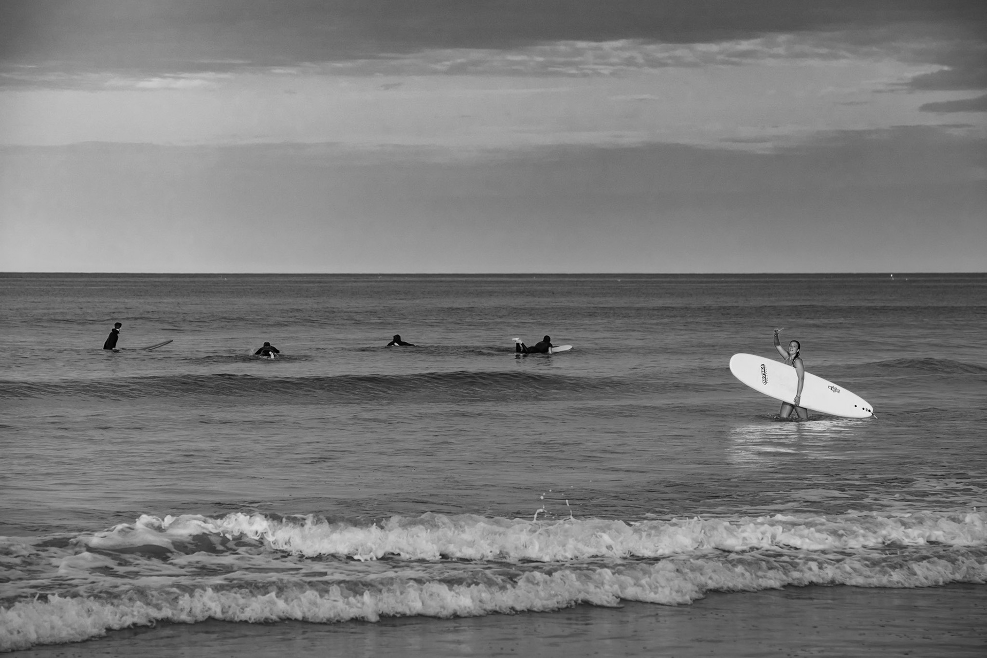 Surfing on Newcomb Hollow Beach in Wellfleet, MA on Cape Cod. (photo by Gabe Palacio)