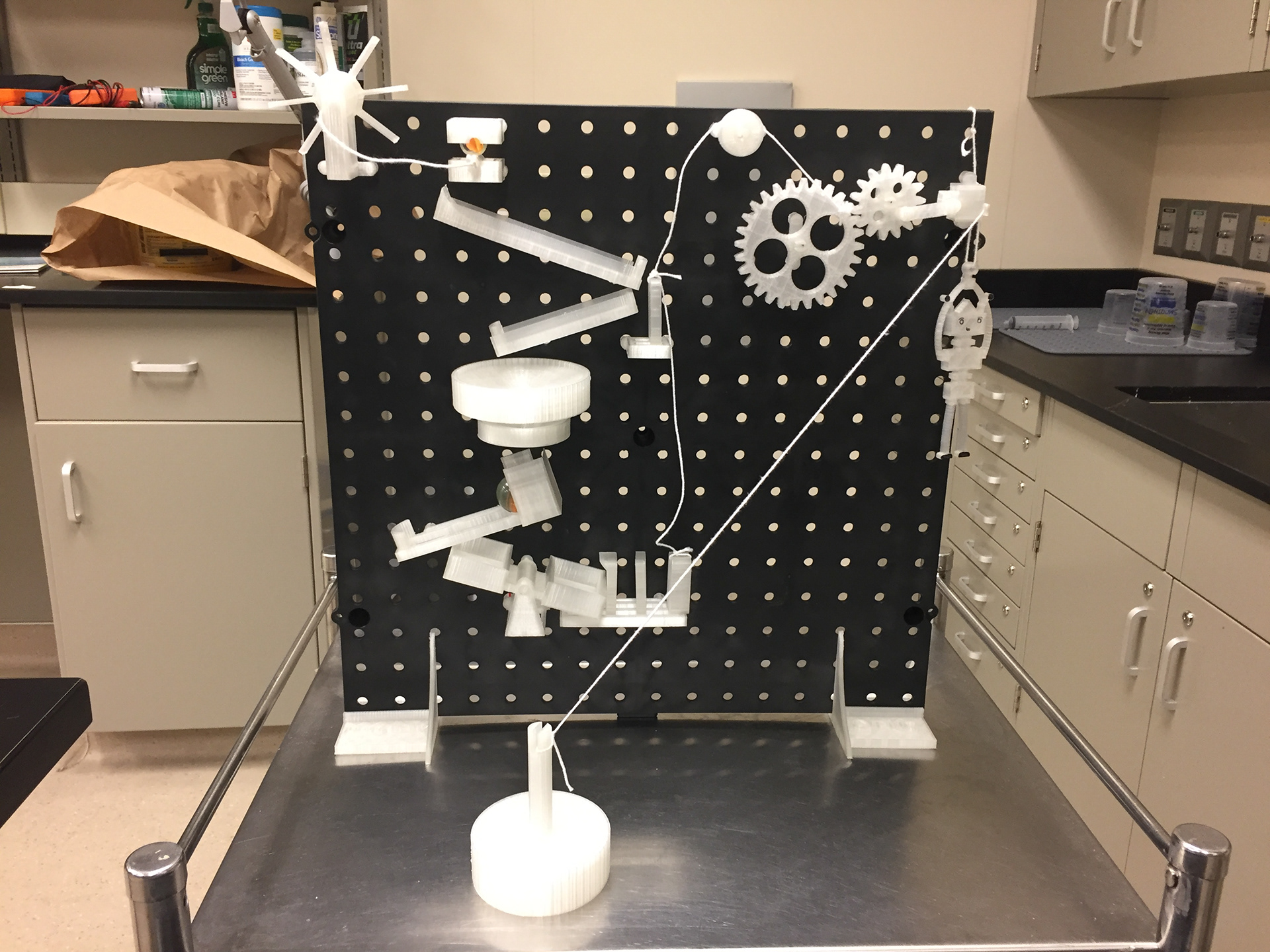 The 3D printed rube goldberg machine. Completely customizable by users, and it's cheaply and efficiently created using a 3D printer (an initial condition for our project).