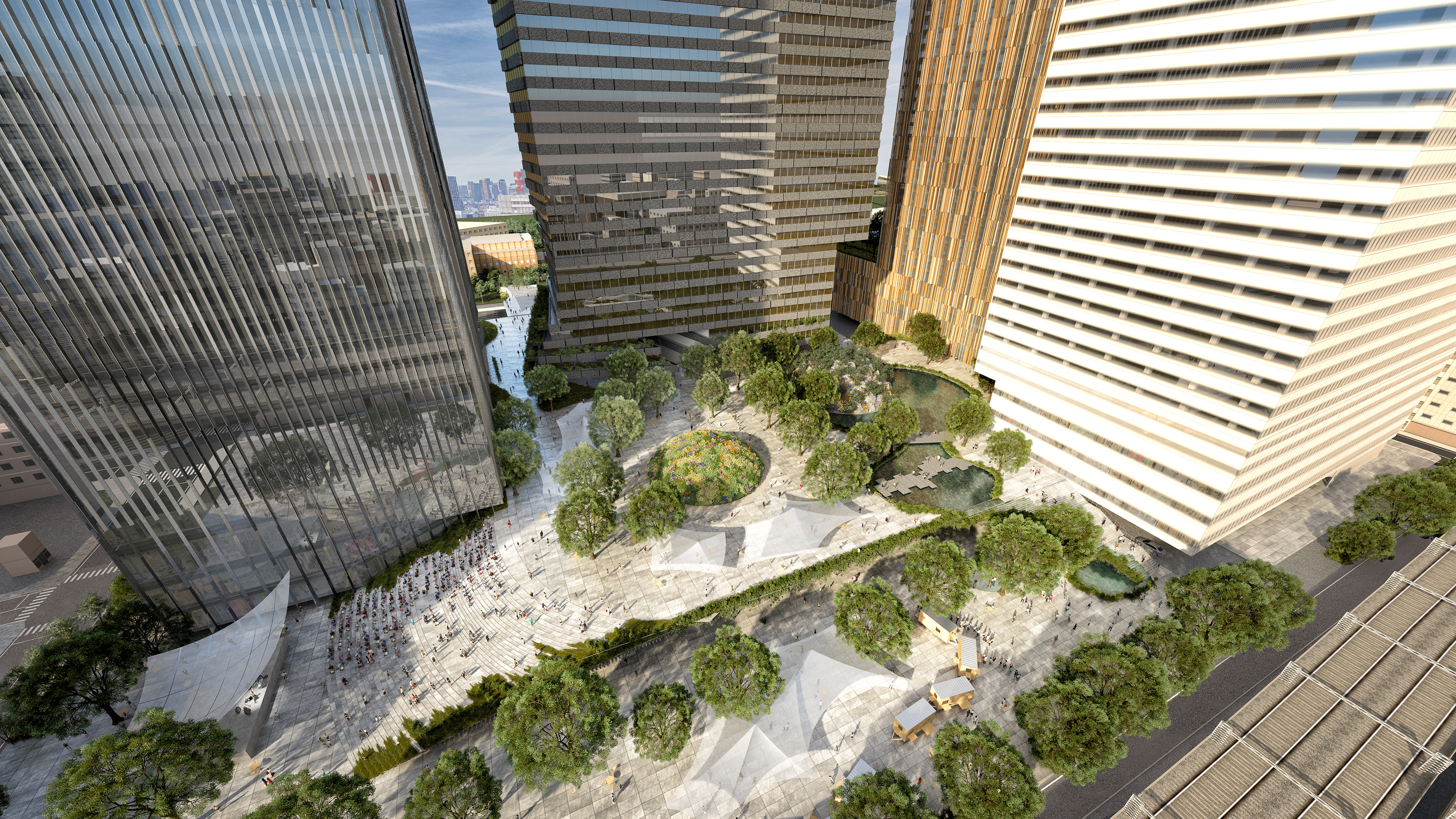 A green public plaza surrounded by tall buildings