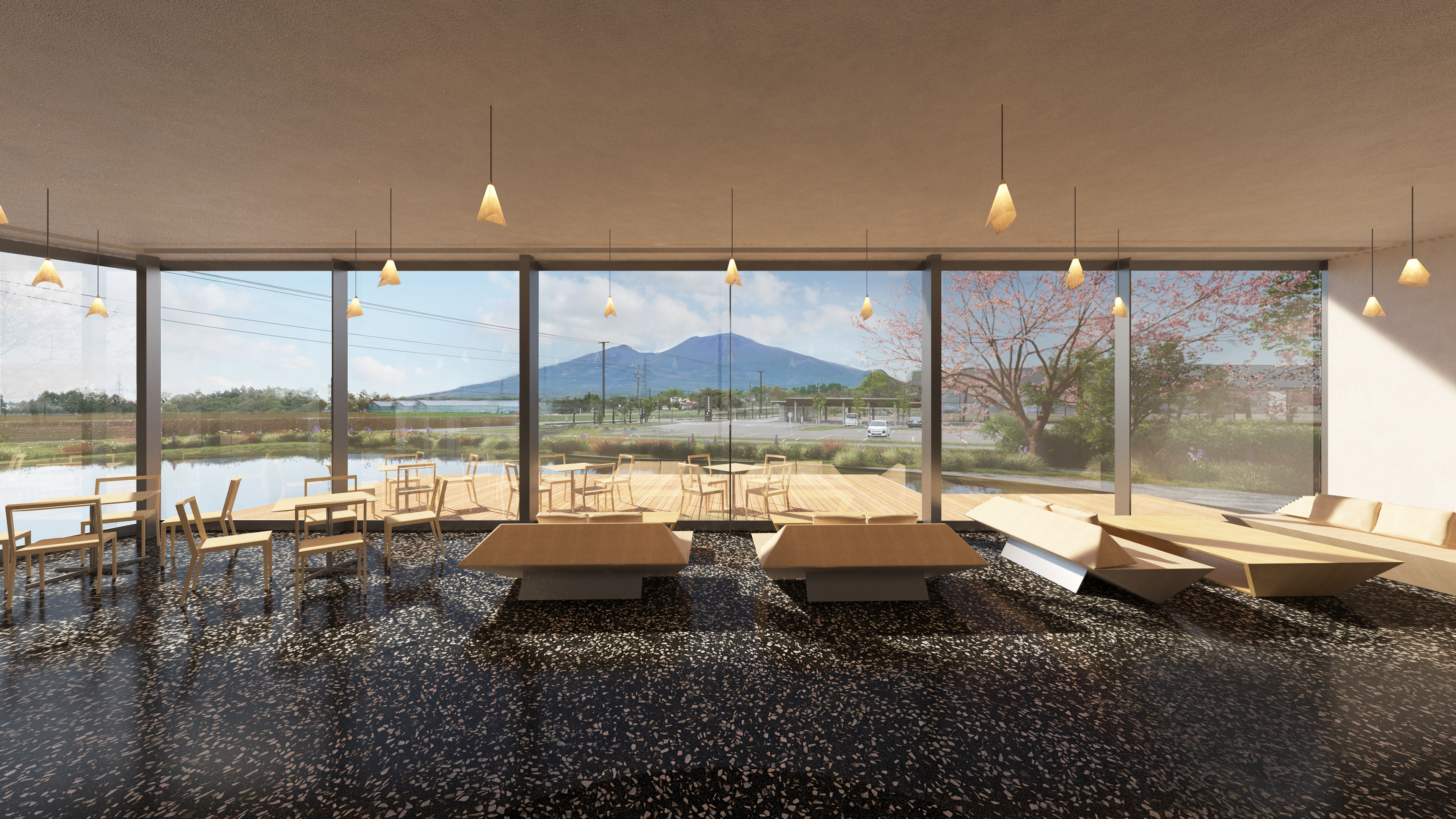 A cafe facing a pond and a mountain view