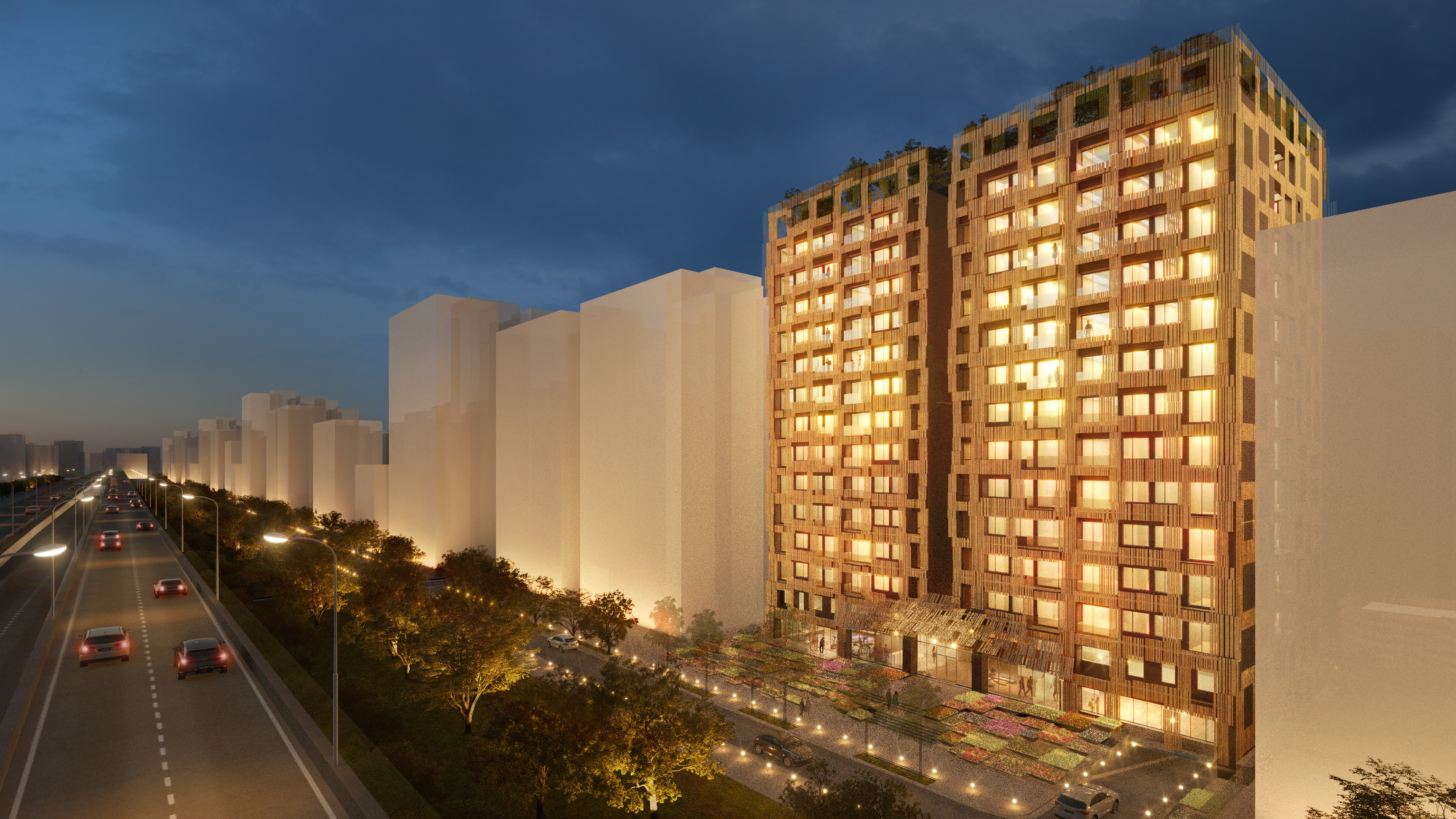 Night view of a lit up appartment building