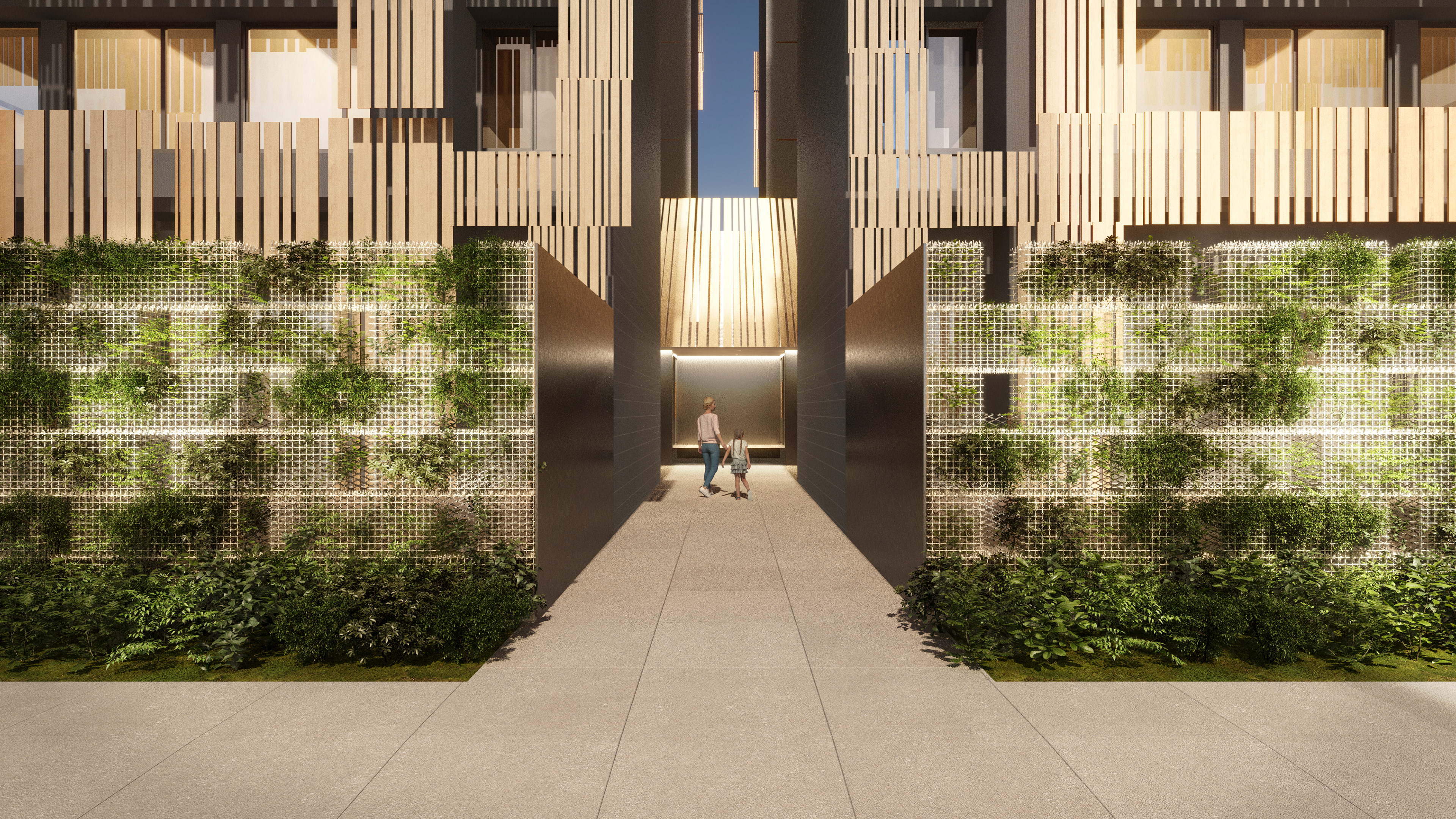 Entrance of an appartment building decorated with greenary