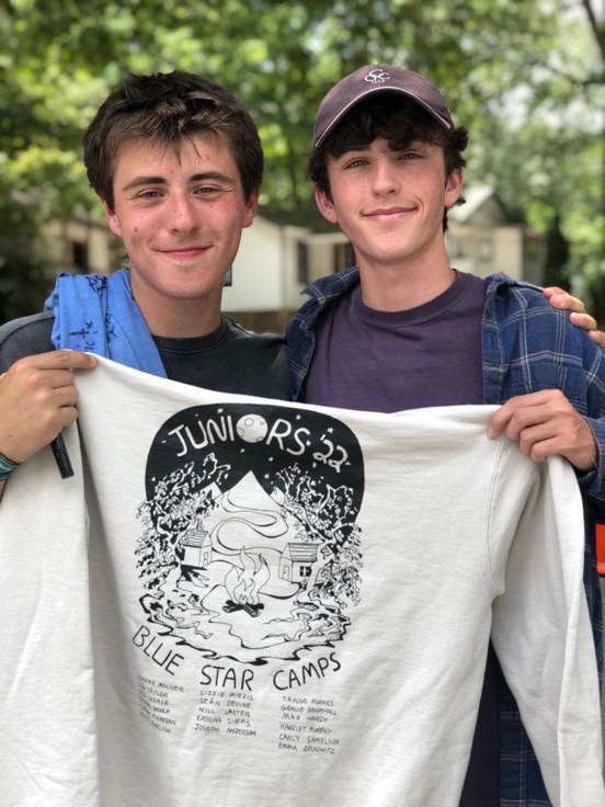 Staff members satisfied with their hoodie