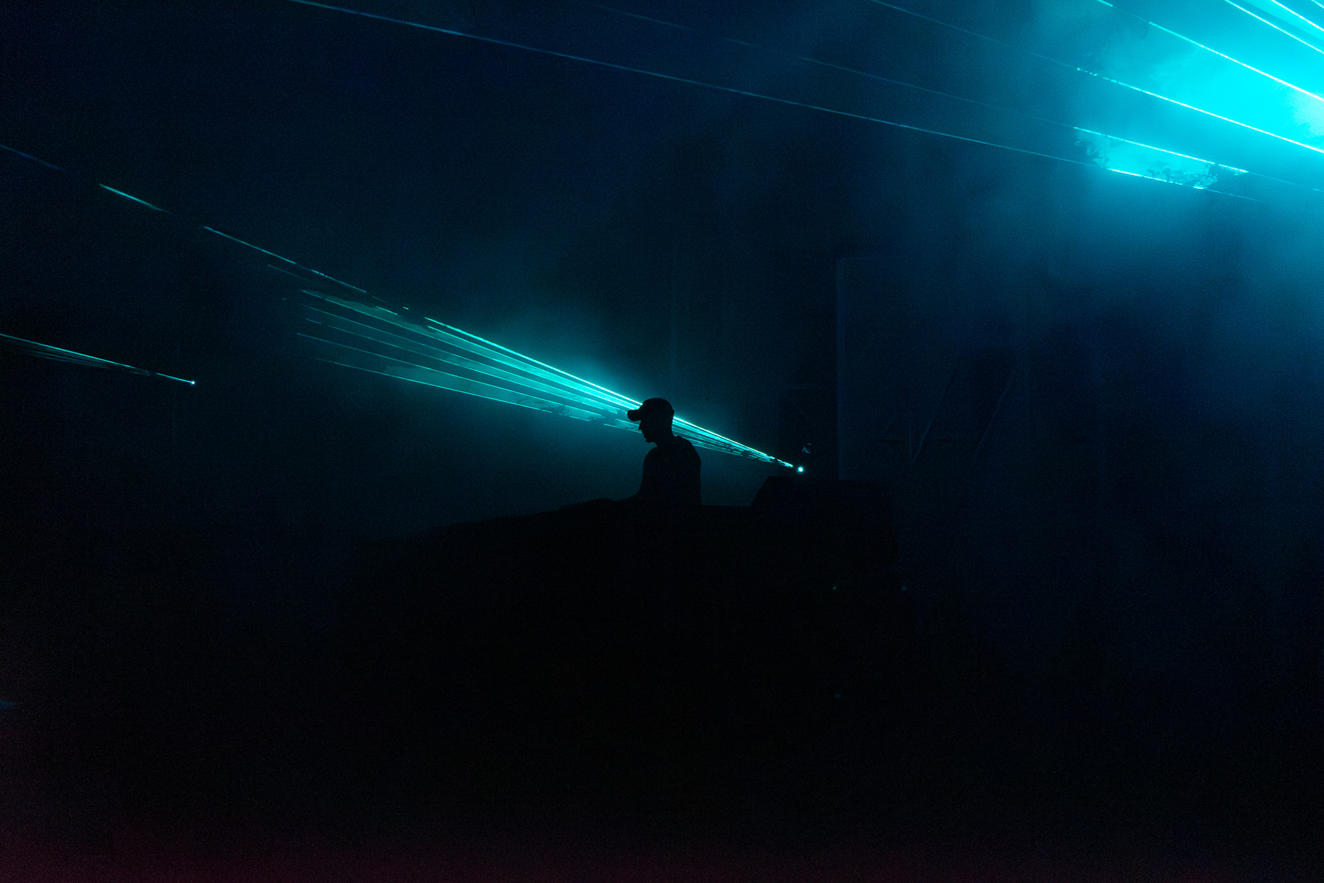 David Löhlein playing hide and seek with the laser of the Texture Festival.