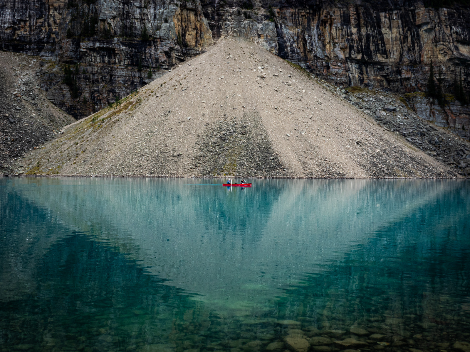 HELD BACK The Rockies-Kayaking in the eye of the reflection by Phil Day