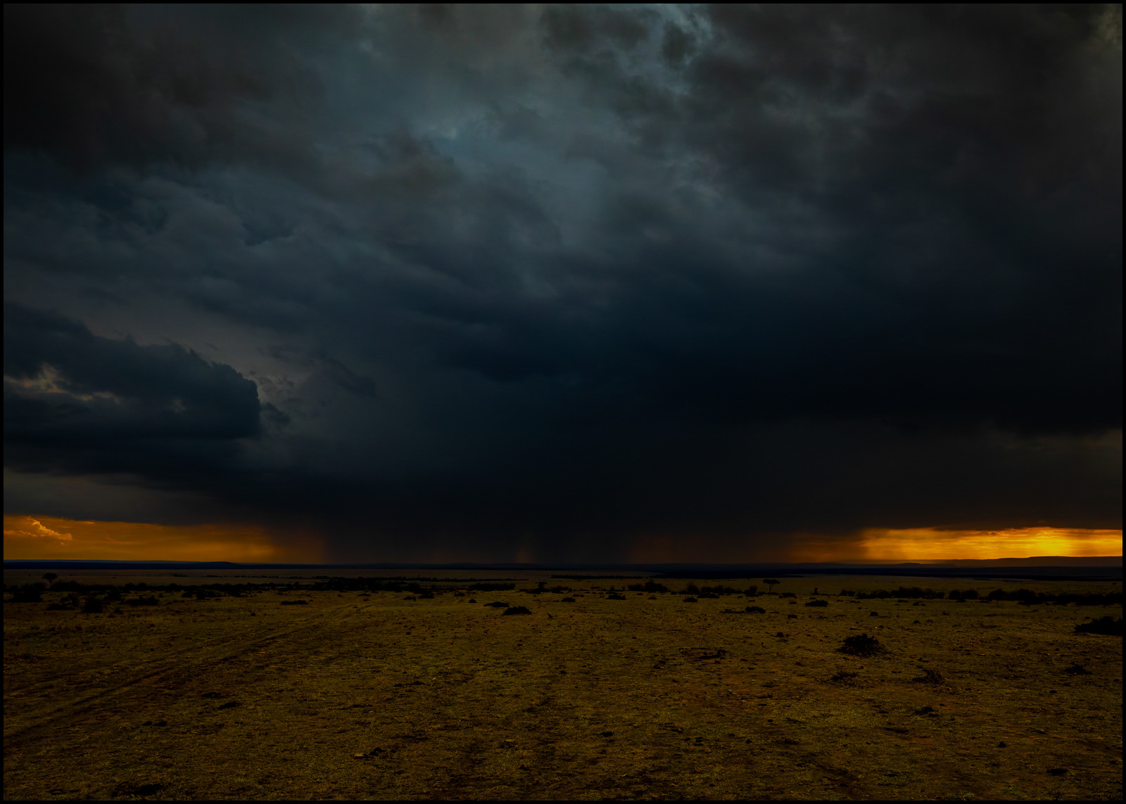 Held Back: Mike Phillipson_Storm approaching across Maasai Mara