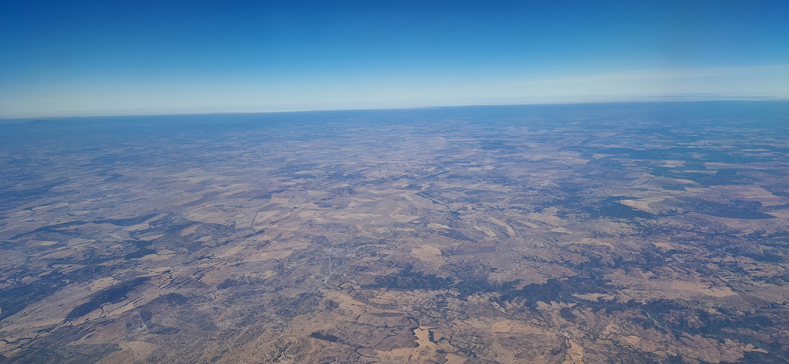 View from a plane by Genetta Aprilante