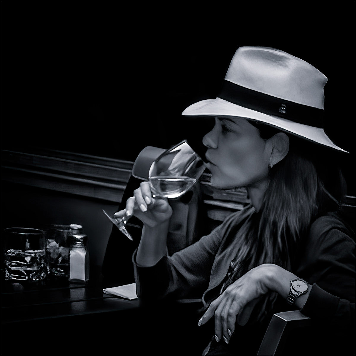 Savouring a  glass of white wine by Richard Milton-Worssell