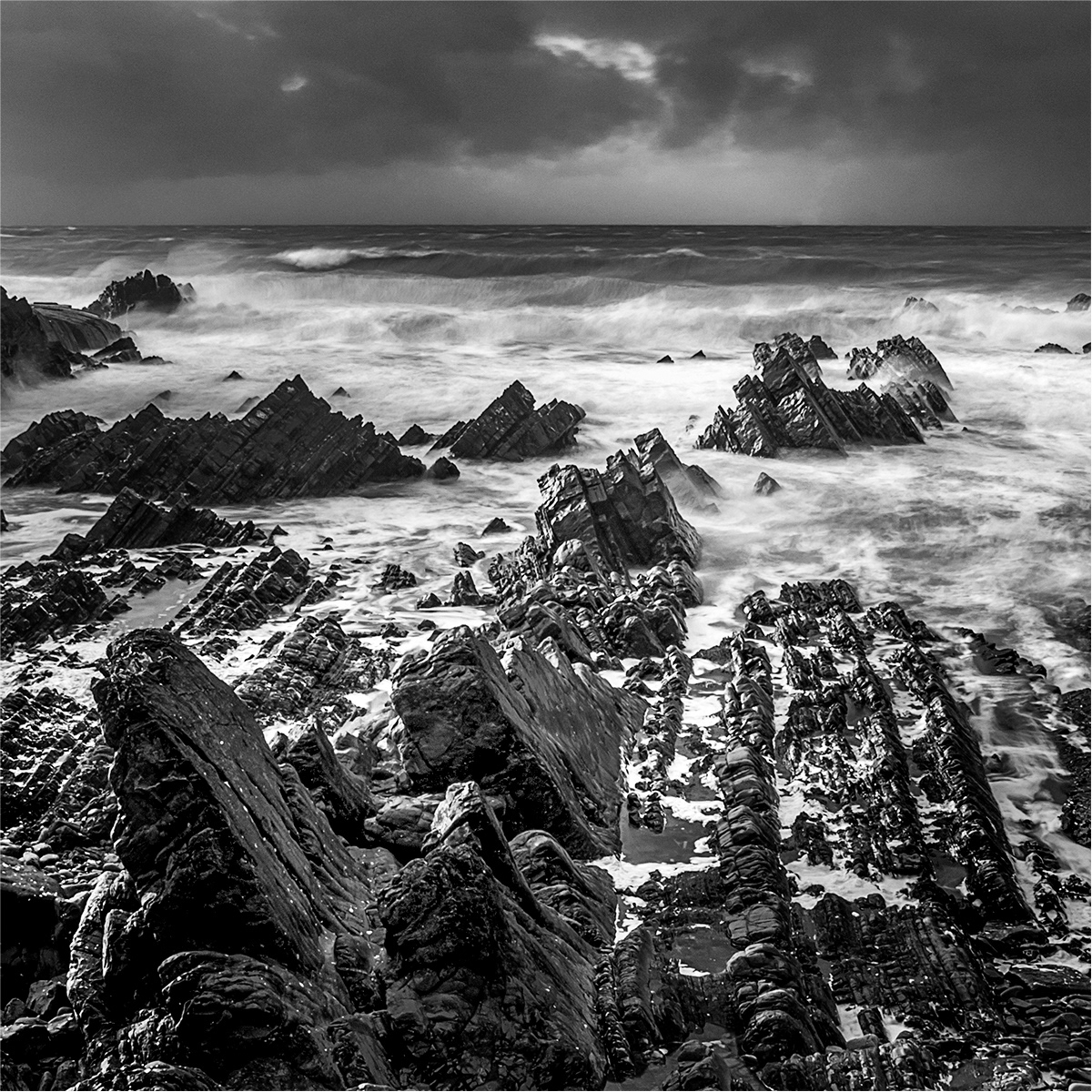 7.00 The rocks Hartland on a stormy day by Bob Ede