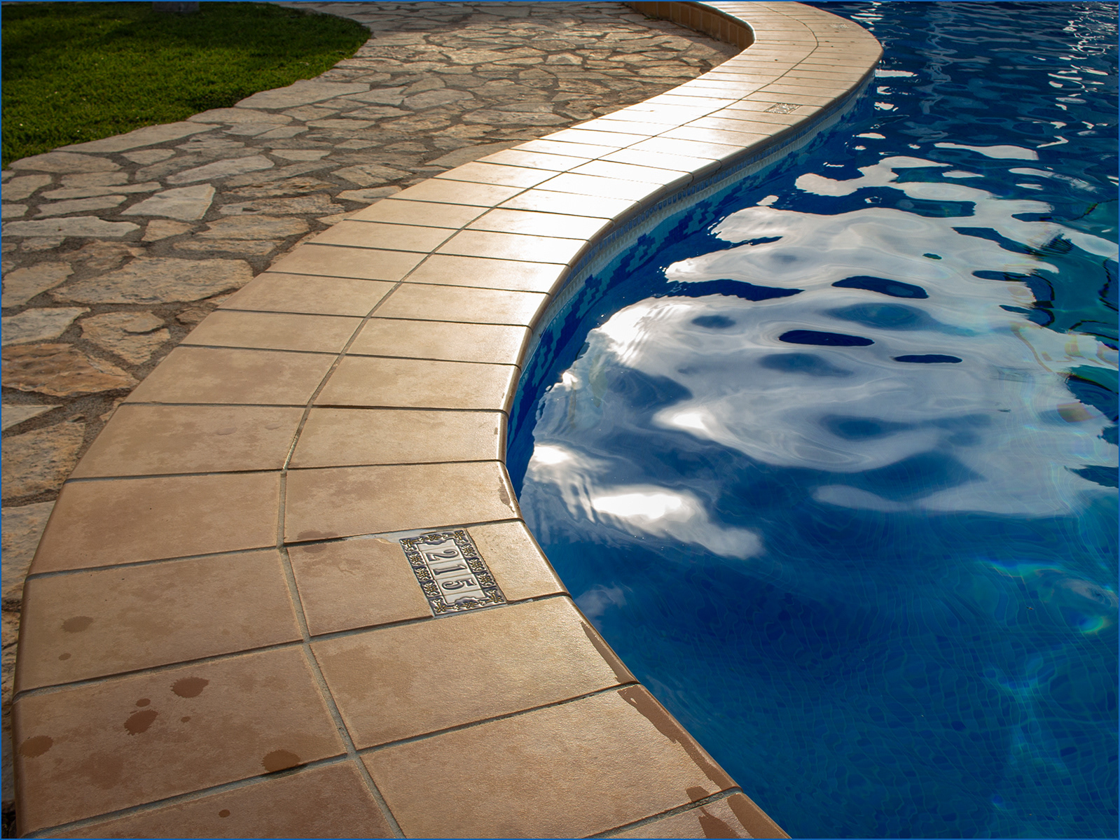 Curve by the pool by Catherine Allum