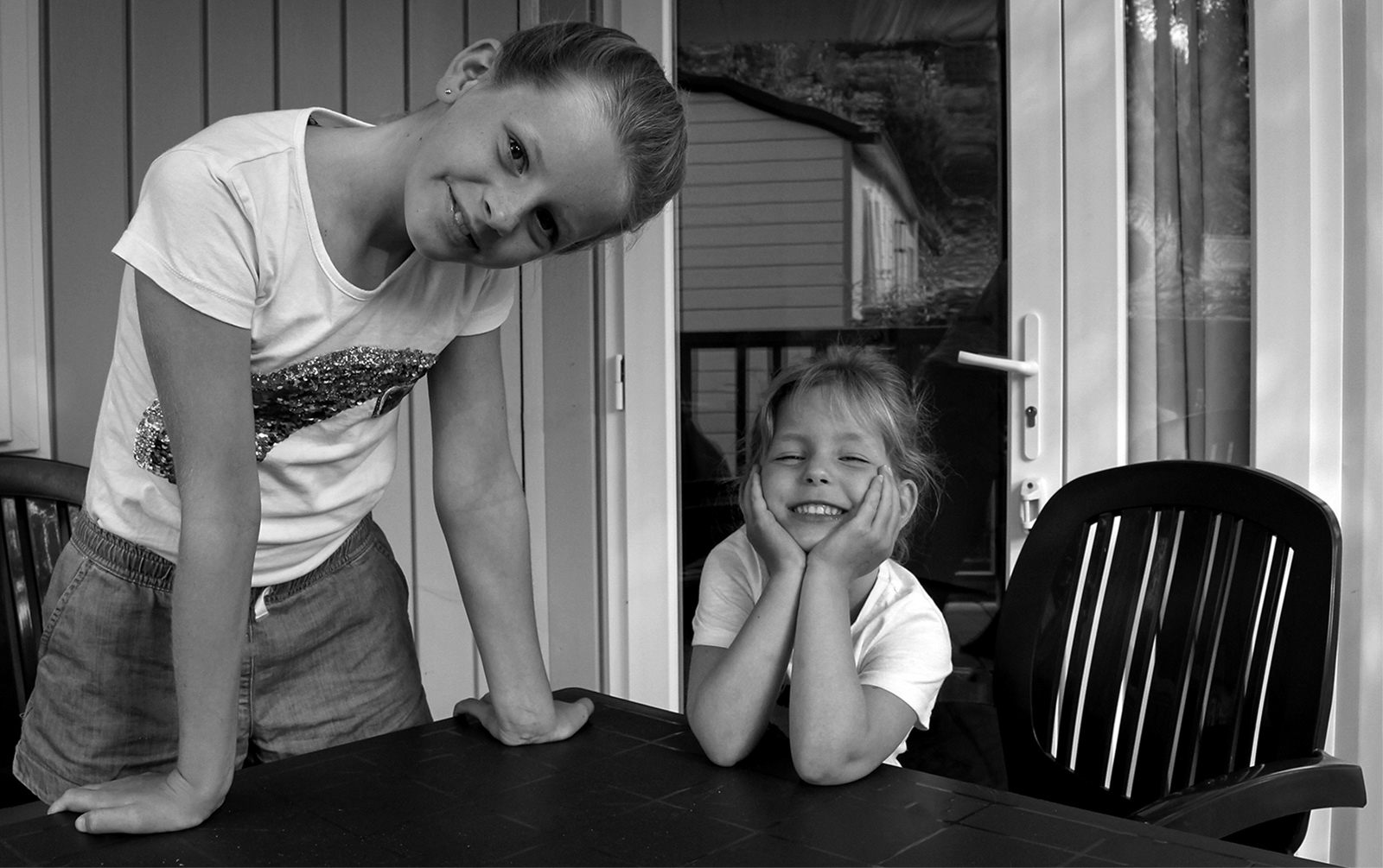 Sisters smiling by Catherine Allum