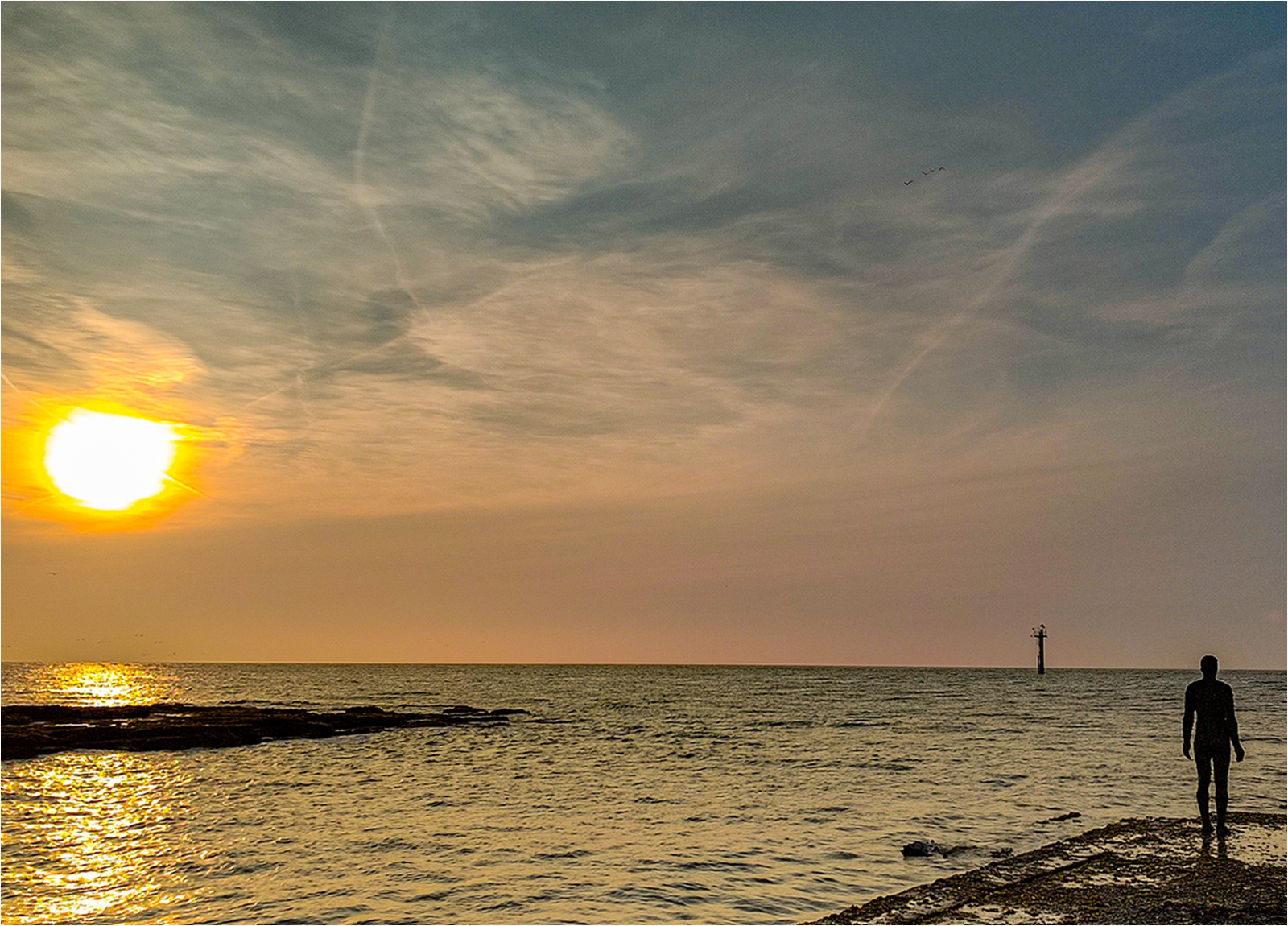 Margate man at low tide by Catherine Allum