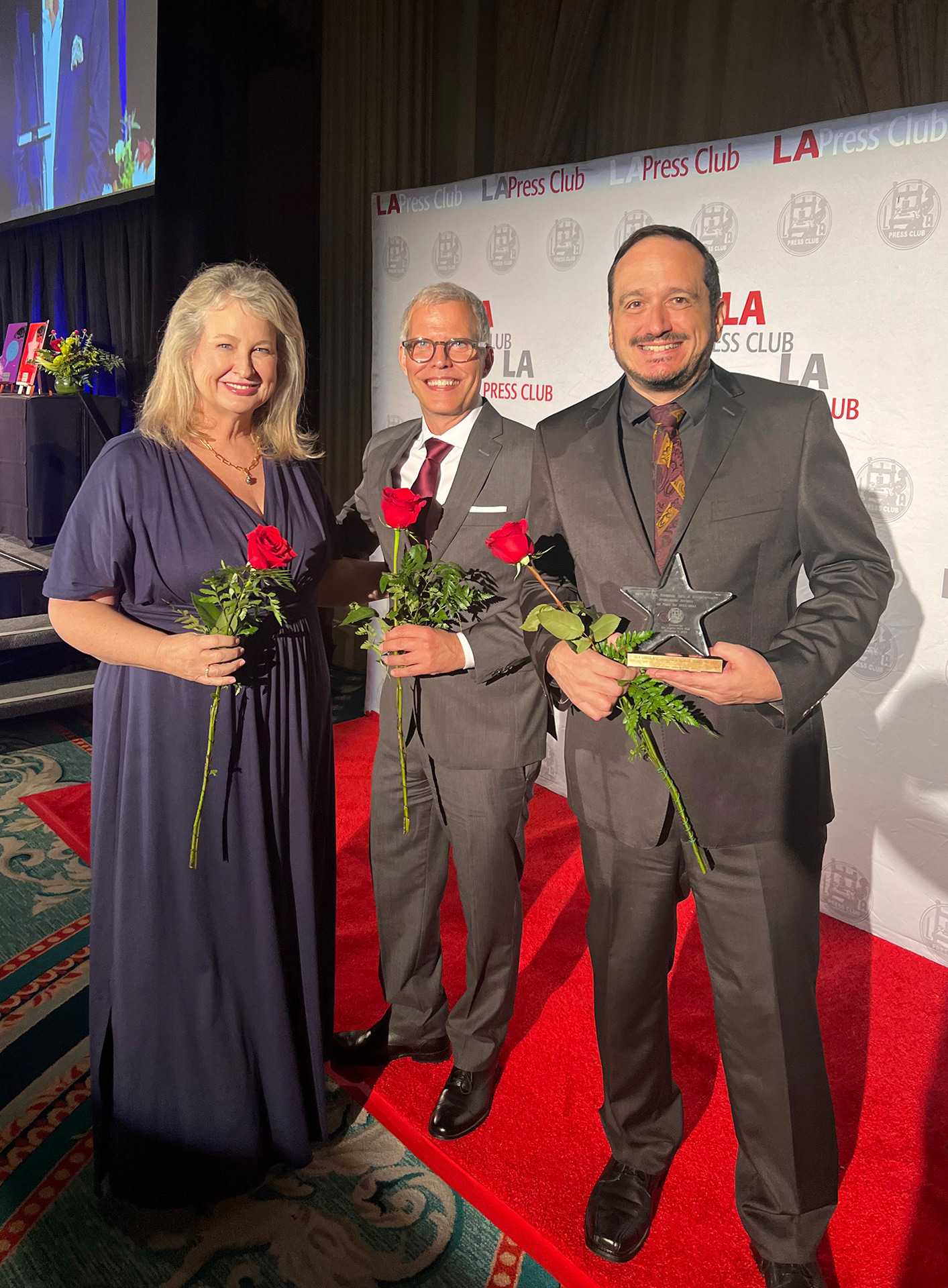 Michelle Merker, Andy, and Dion after receiving our award - photo: Maria Hall-Brown 