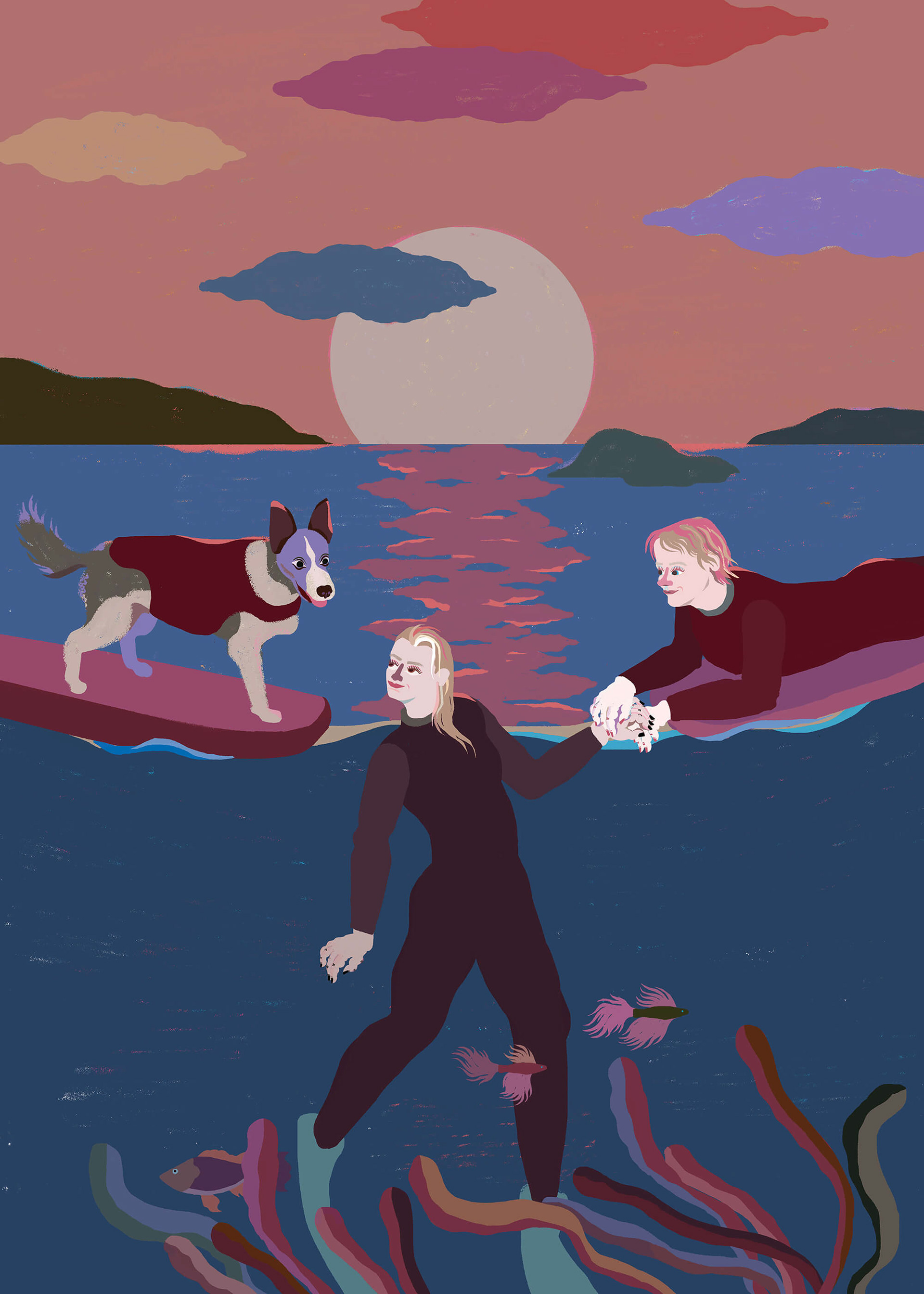 Two women and a dog on a surfboard at sunset on the ocean