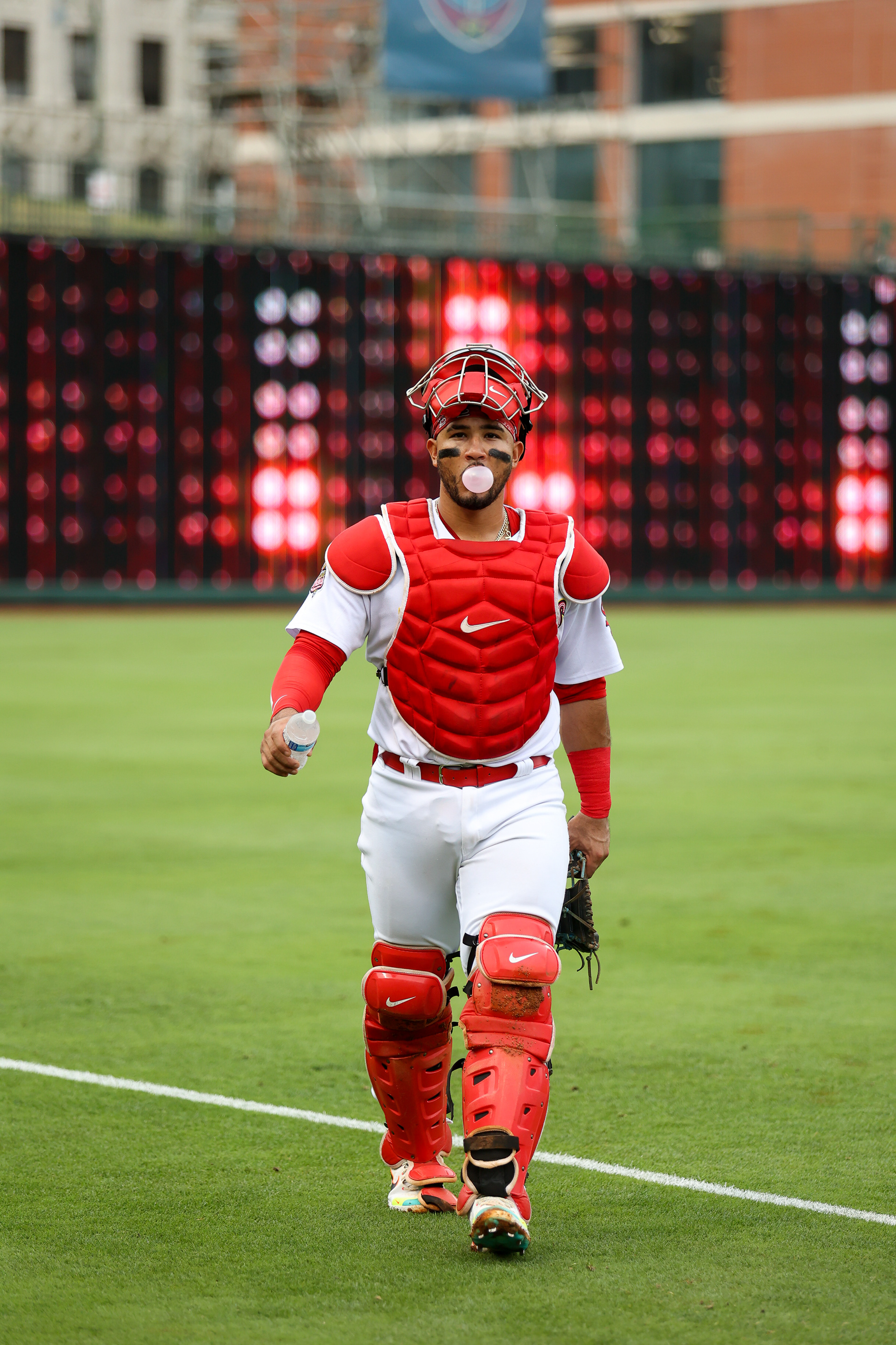 Memphis Redbirds Catcher walks off the field after warmups