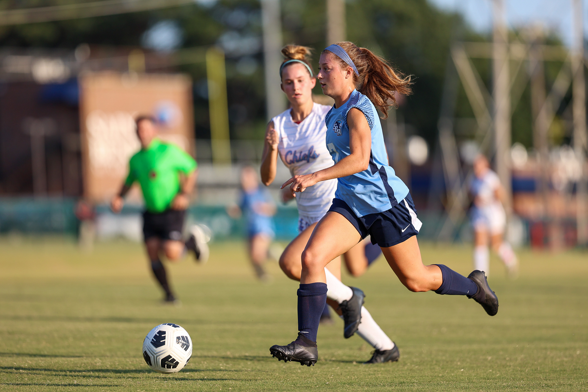 Lily Demilo sprints towards the goal against Magnolia Heights