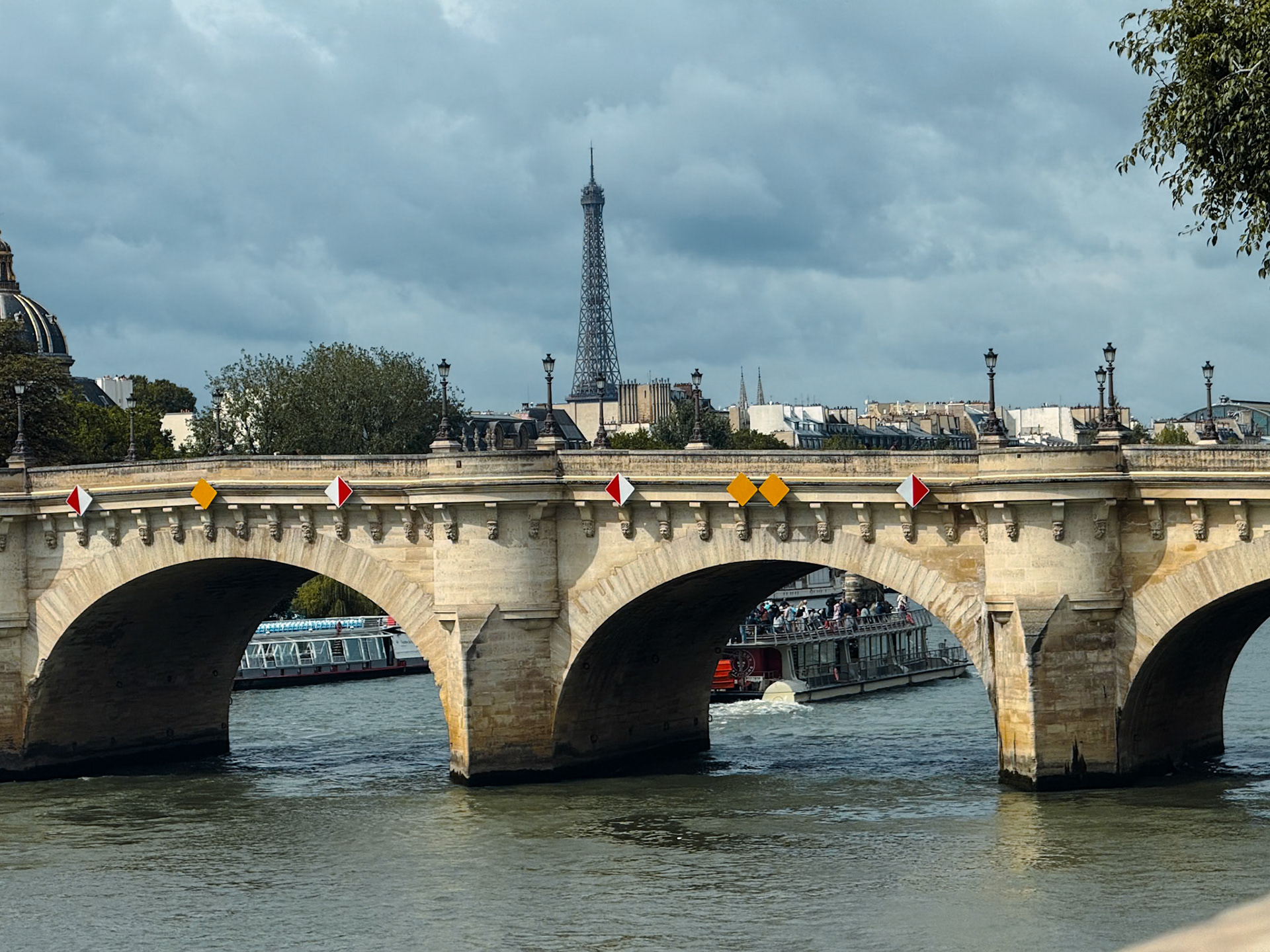 Pont Neuf with the Eiffel Tower in the background.