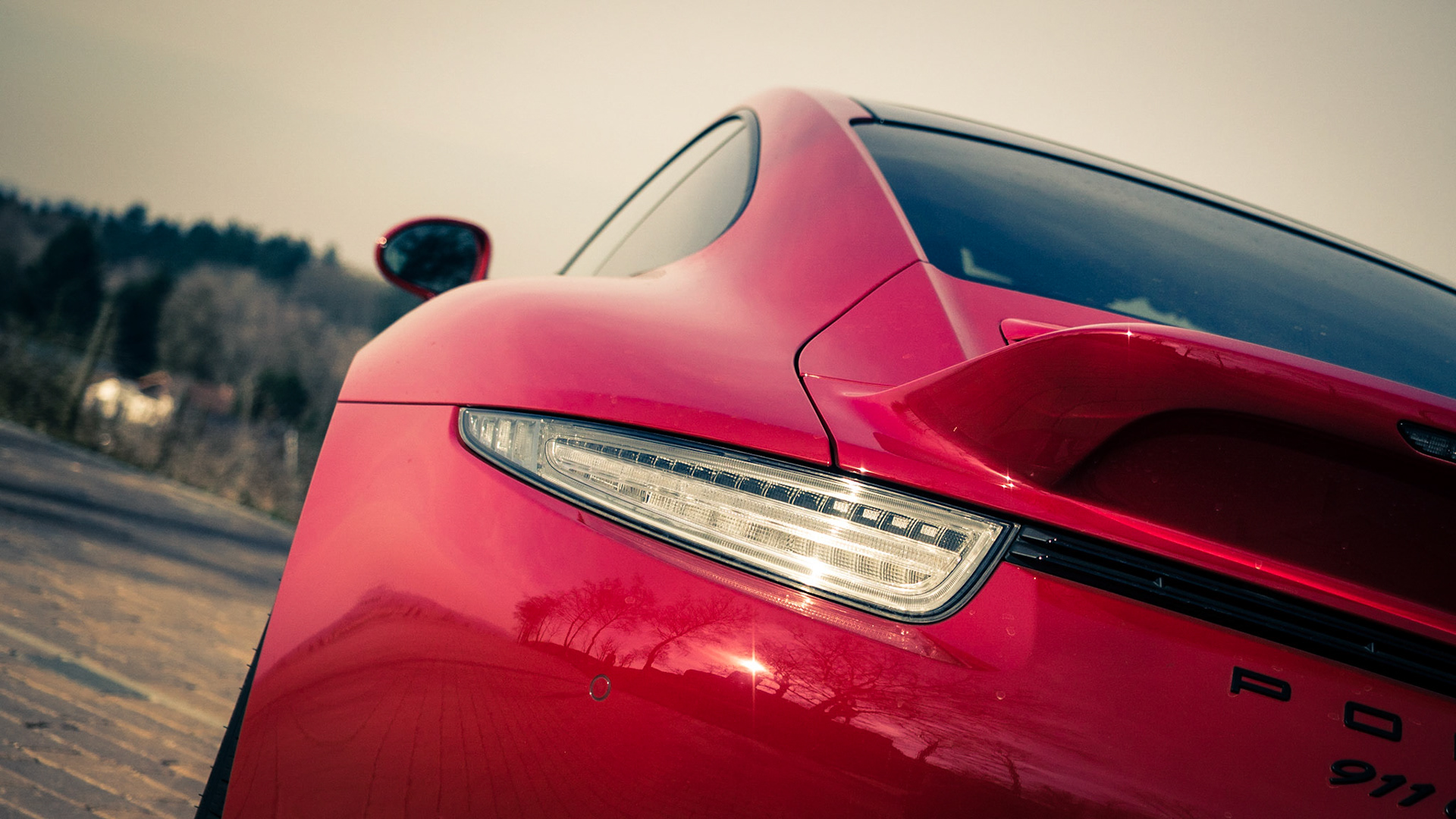 Tail shot of Porsche 911 GTS (991) showing the custom Porsche Tequipment taillight.