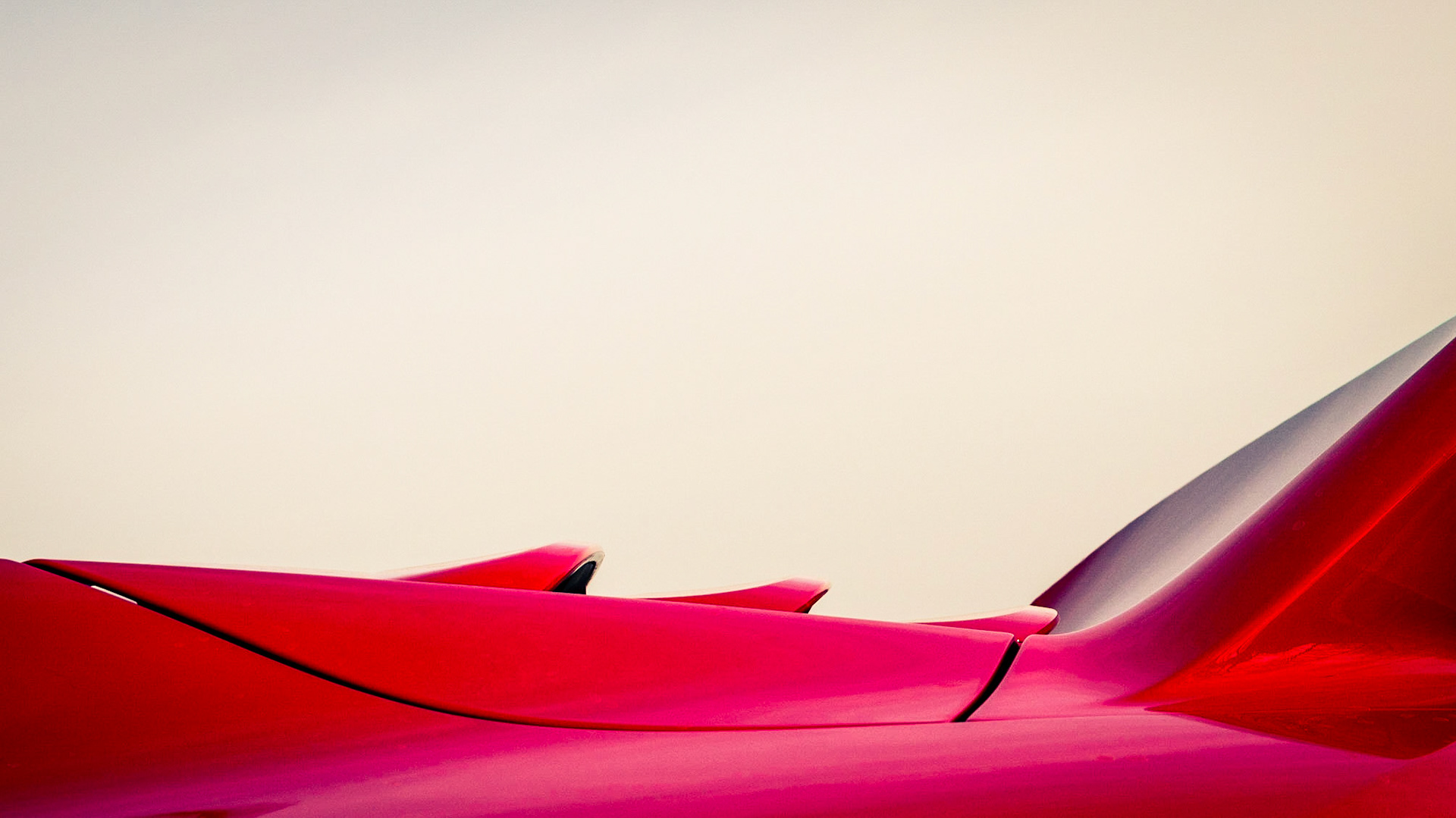 Rear end detail shot of Porsche 911 GTS (991) showing a part of the rear spoiler and engine cover.