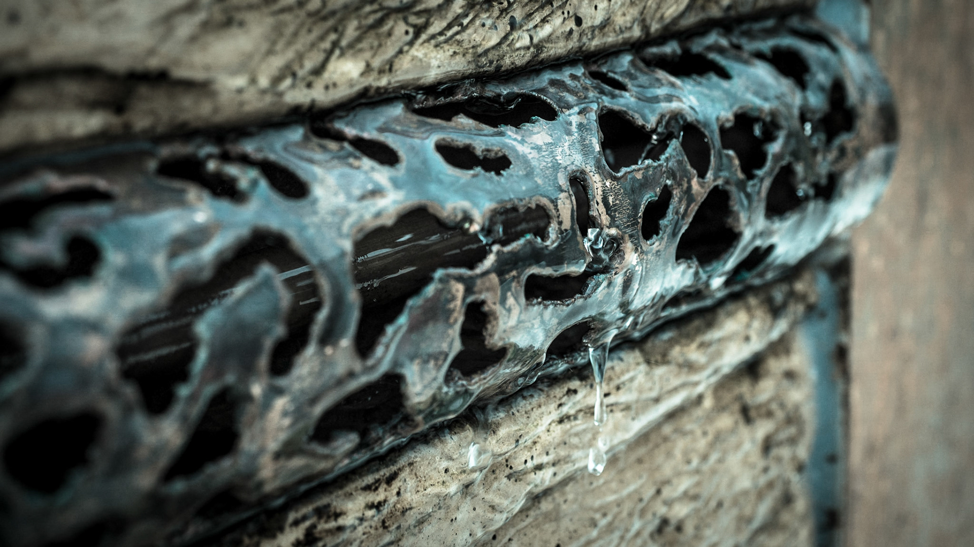 Wonderful piece of crafted metal. This pipe was decoratively used to make a small fountain. Senn @Landesgartenschau Schwäbisch Gmünd, Germany