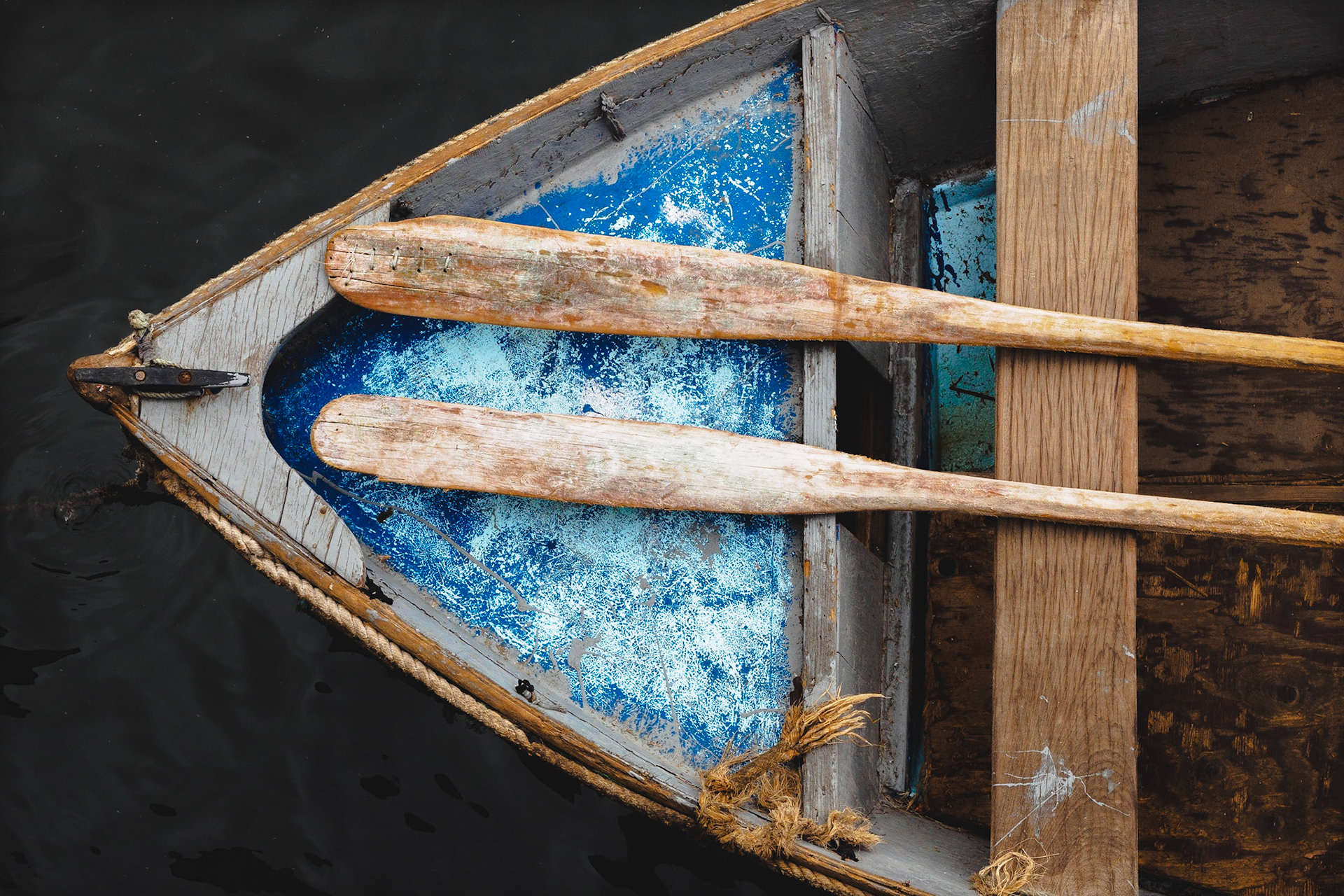 With boats like these the fishermen of Paul do Mar go out for fishing. I really like the faded and repaired blue colour.