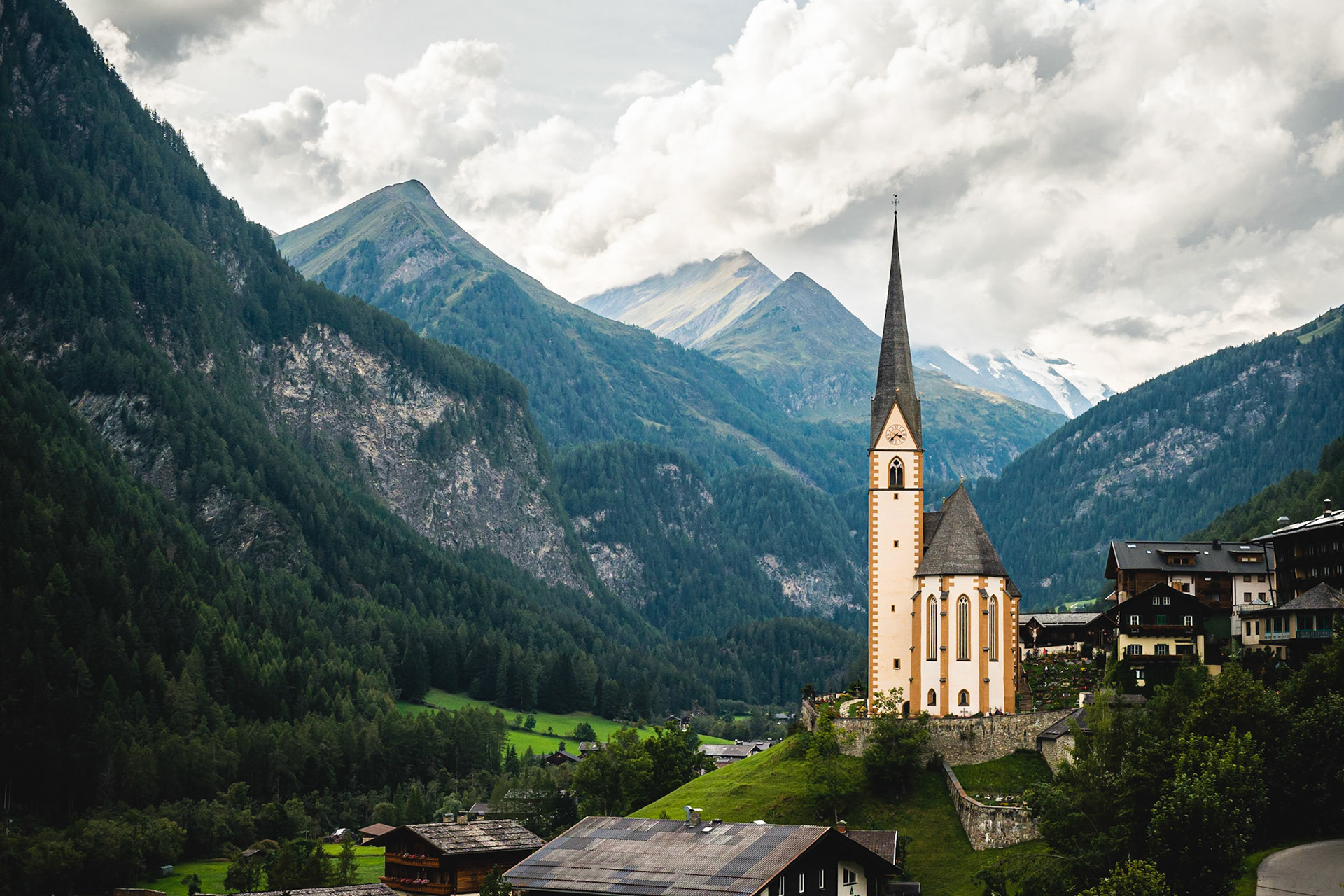 The small village of "Heiligenblut" is located in the high valley of the High Tauern at the foot of the "Großglockner" mountain. The catholic Parish Church you see here is a famous landmark.