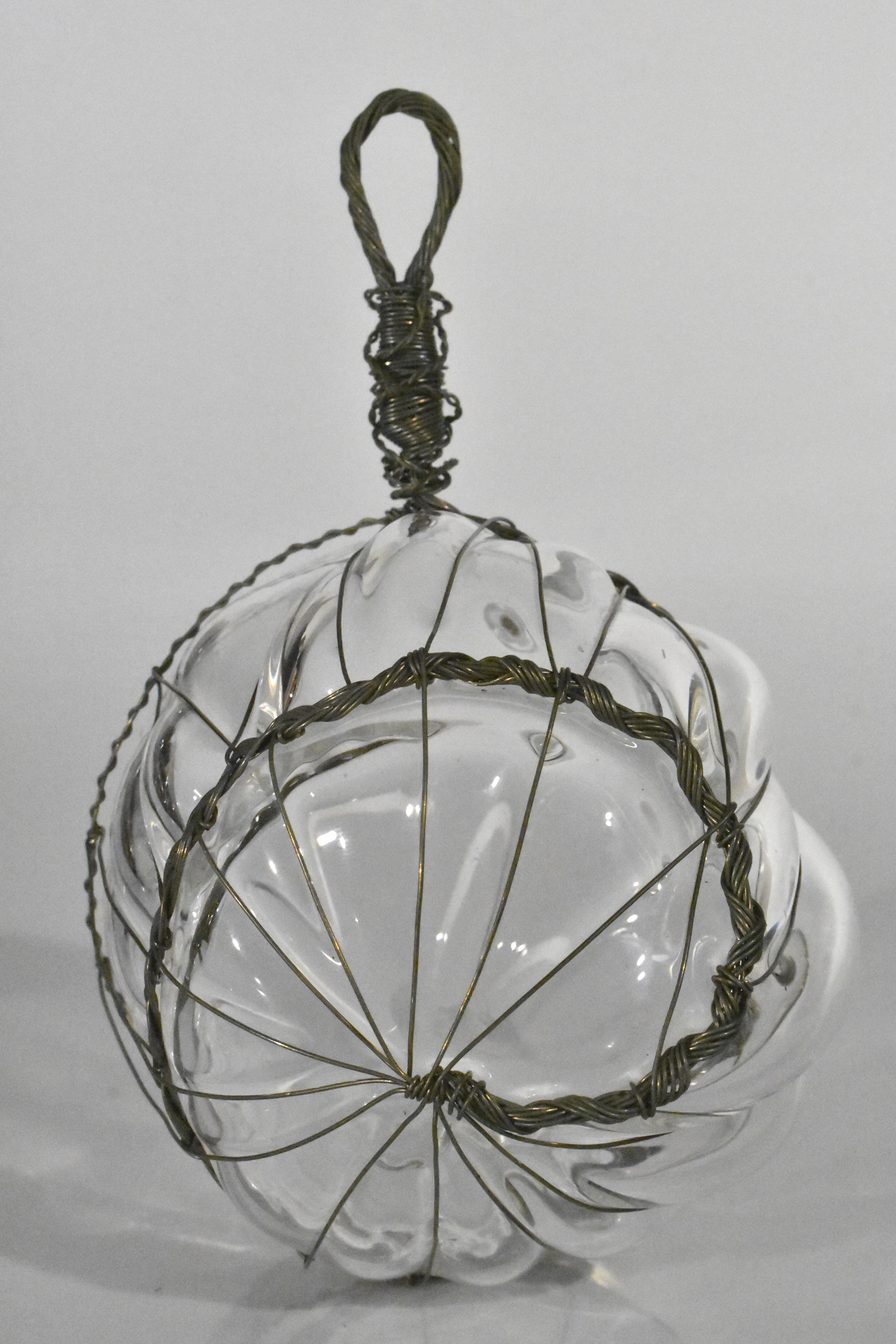 Hanging Spiral Cage, 2018, Blown glass and steel wire