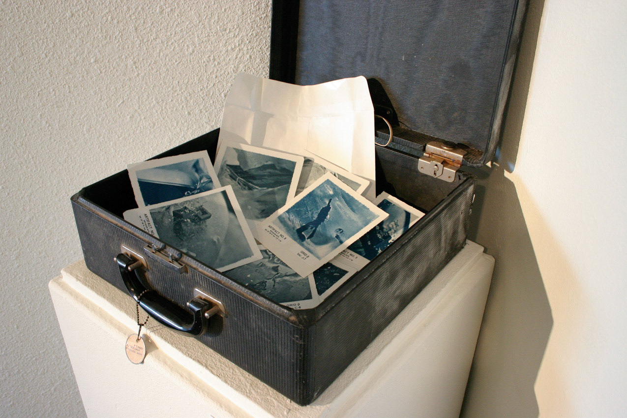 Exhibition View No. 2; Found case with envelope containing the images; © 2005