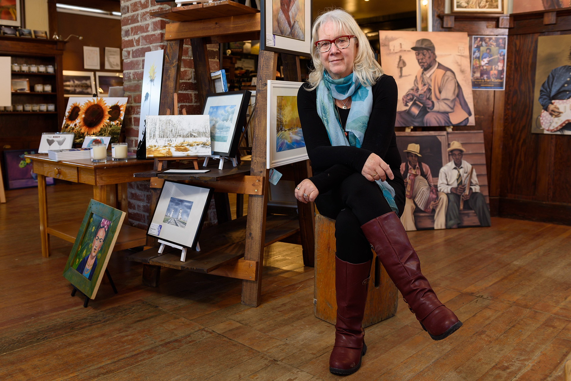 Lorraine Hjalte poses in her photography studio and gift shop in Nanton, Alta., on Wednesday, March 9, 2022.