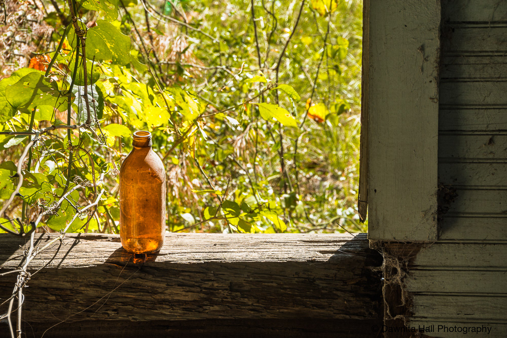 Brown Bottle in Window