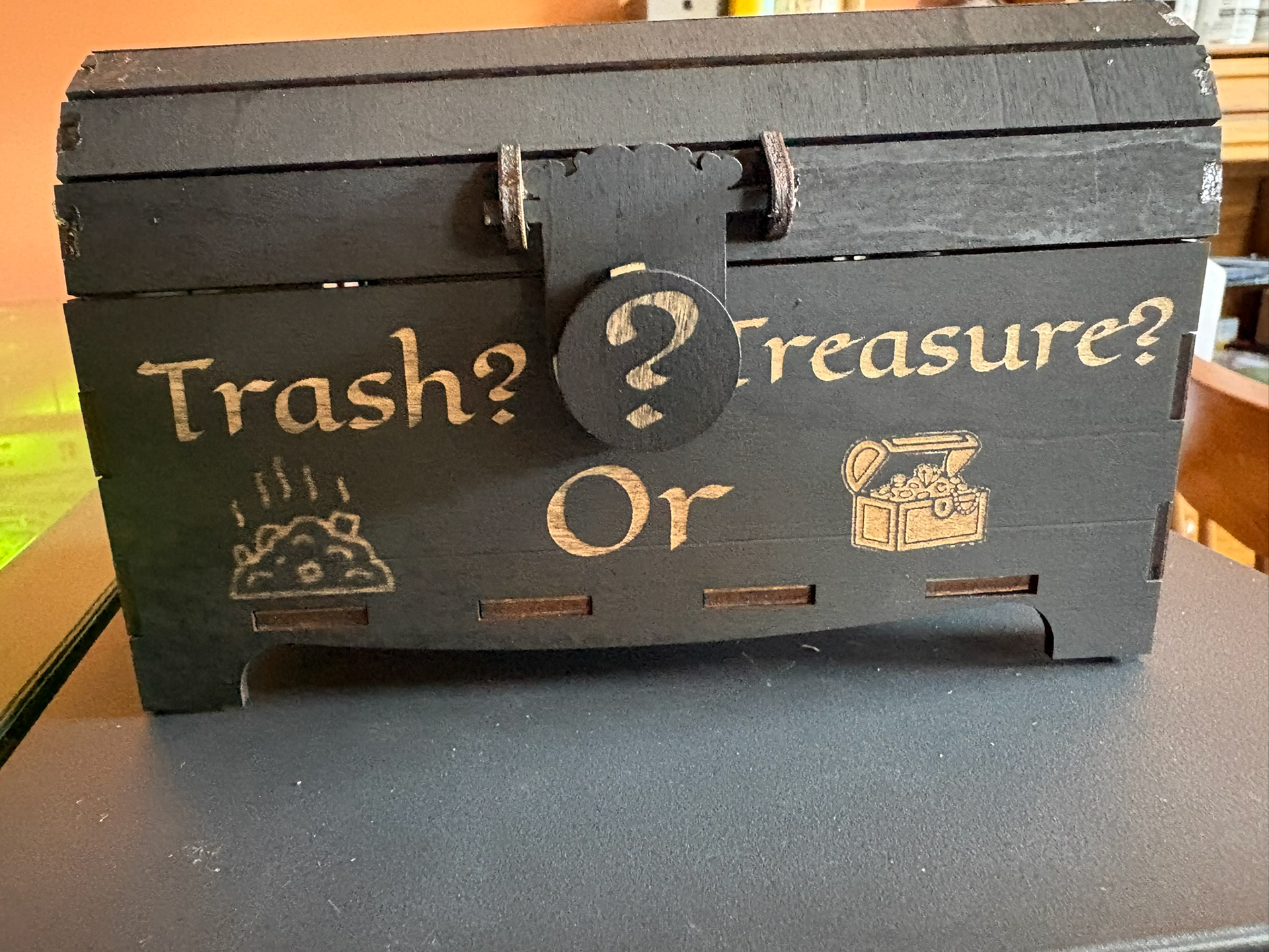 A treasure box that you open by turning the question mark