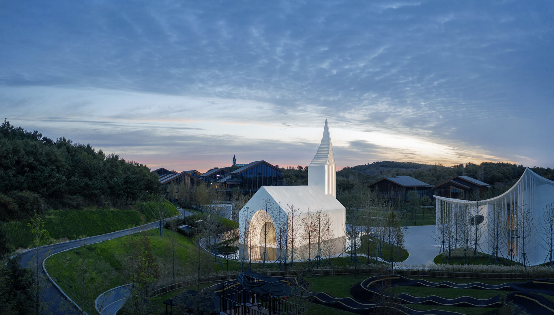 The Church Embedded in the Landscape - Photography: © Shengliang Su