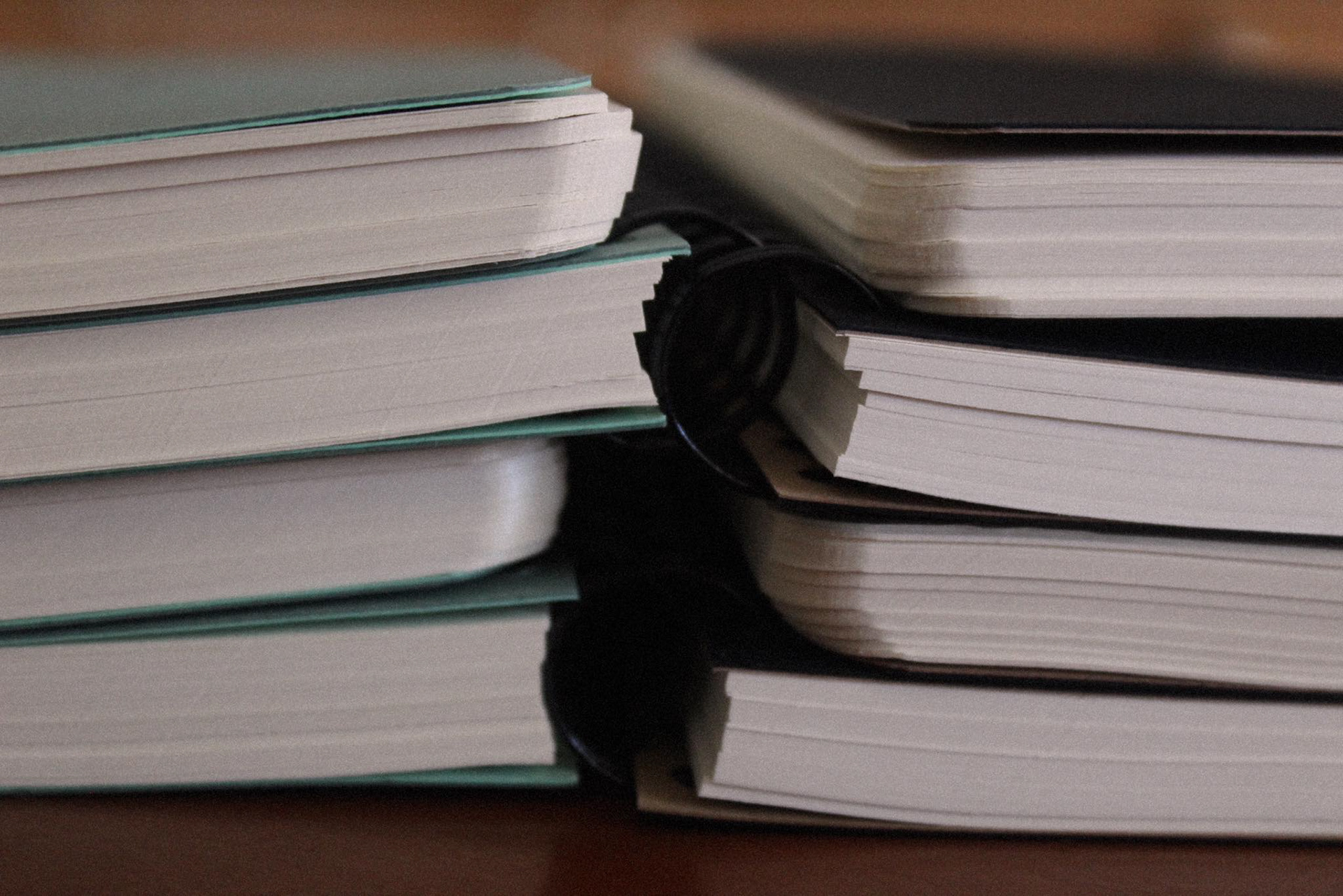Tinagendas with their spiral binding, allowing for the agenda to open fully