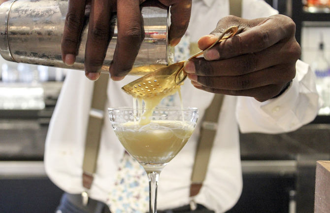 Price pouring the Gold Goose cocktail